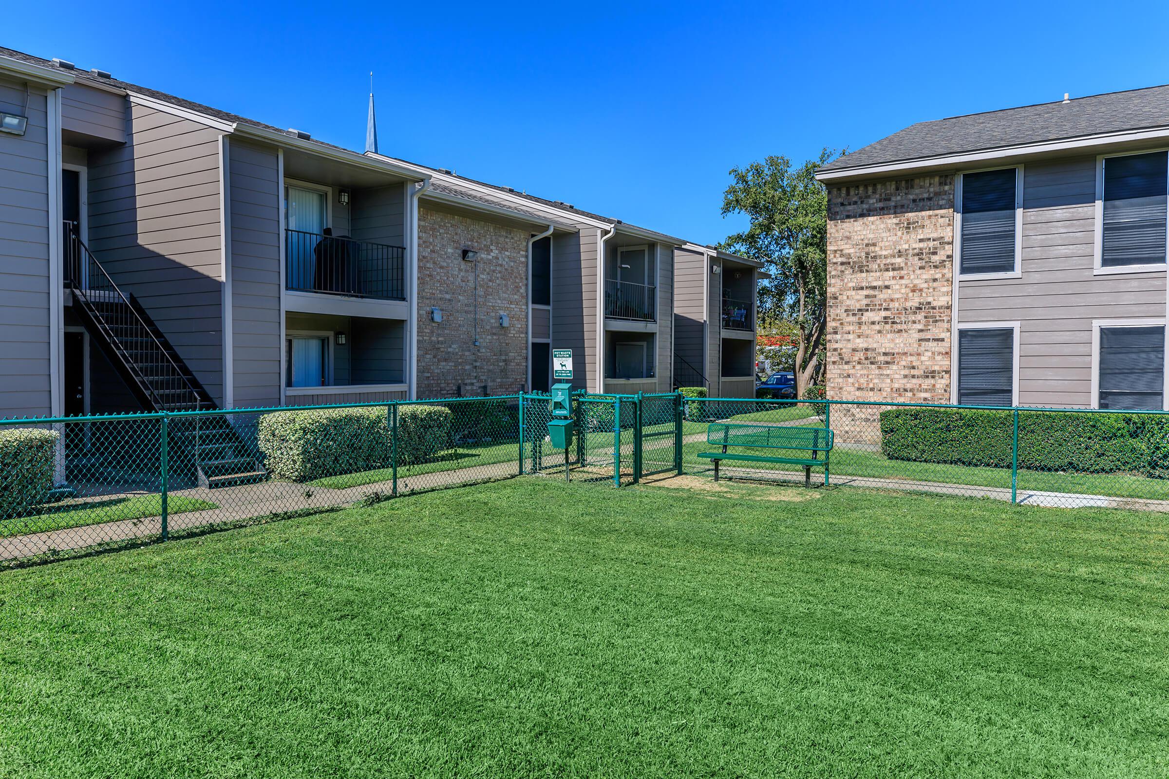 a large lawn in front of a house