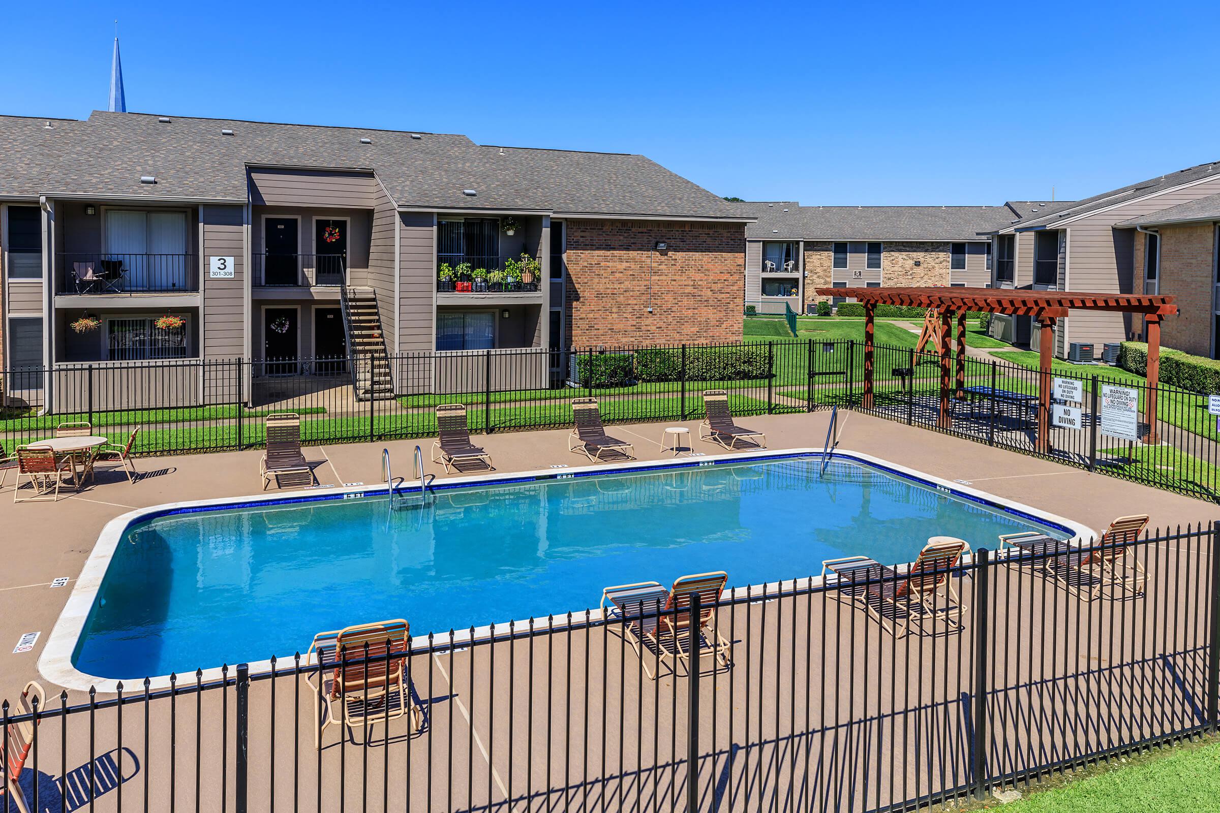 RELAX BY THE SHIMMERING SWIMMING POOL