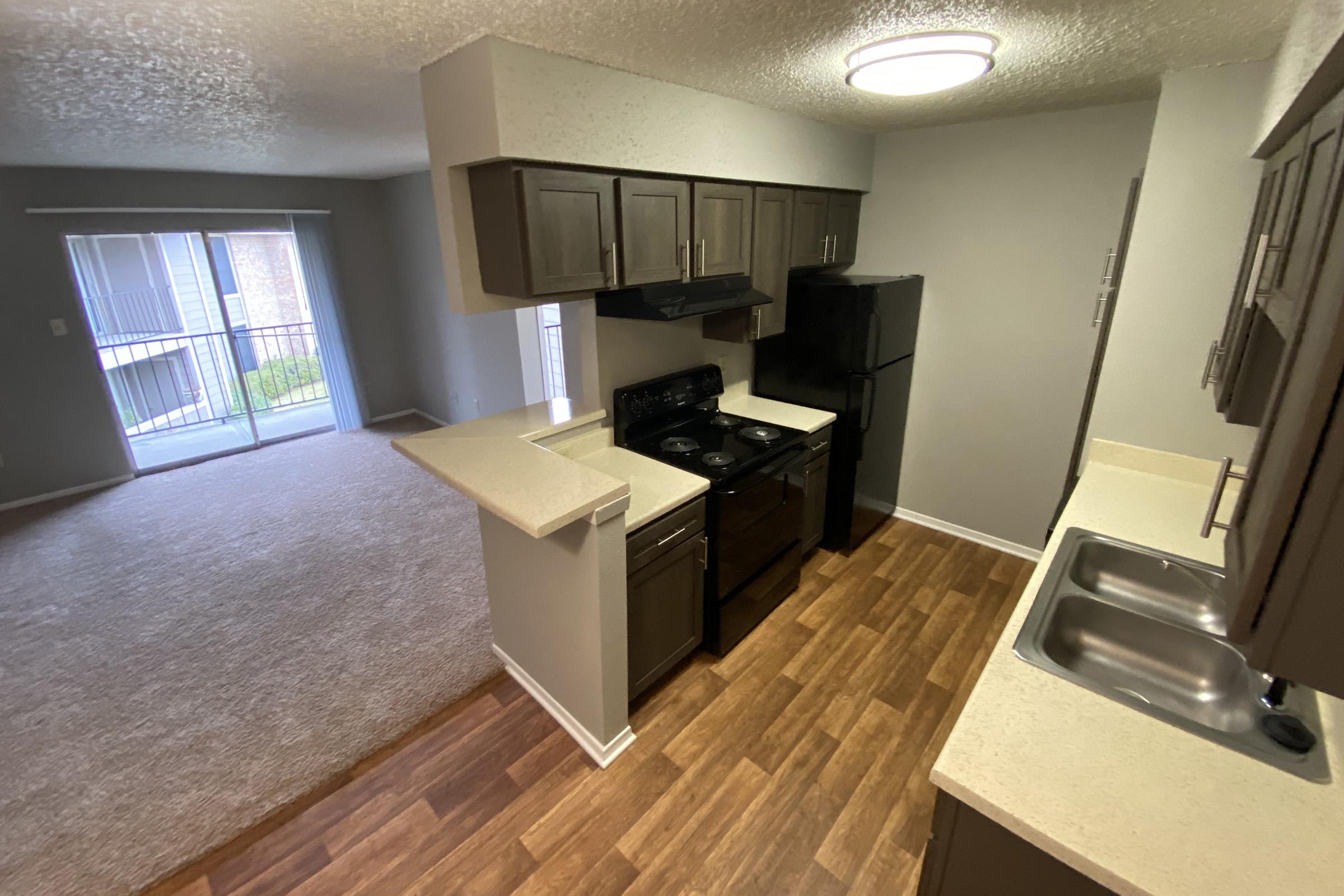 a modern kitchen with stainless steel appliances