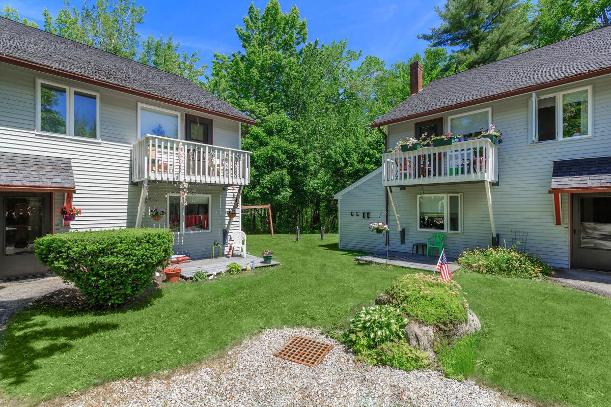 a large lawn in front of a house