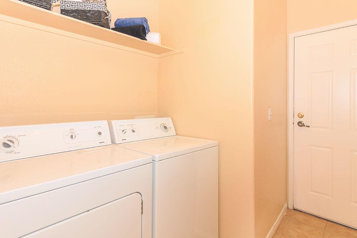 a white refrigerator freezer sitting inside of a kitchen