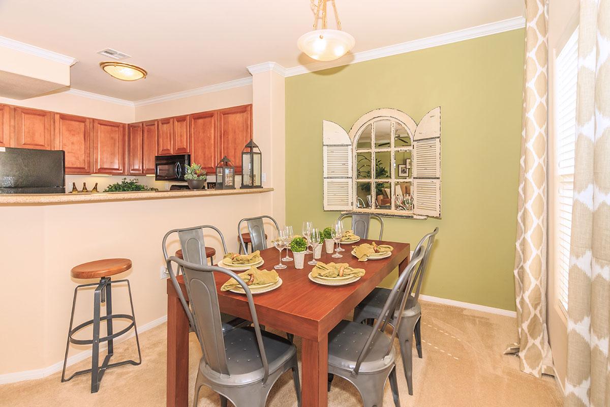 a kitchen with a dining room table