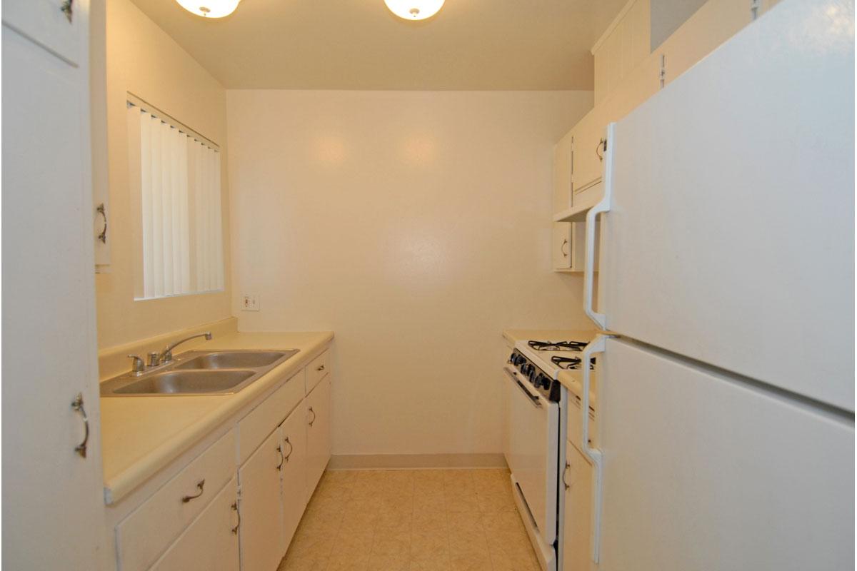 a white sink in a small room