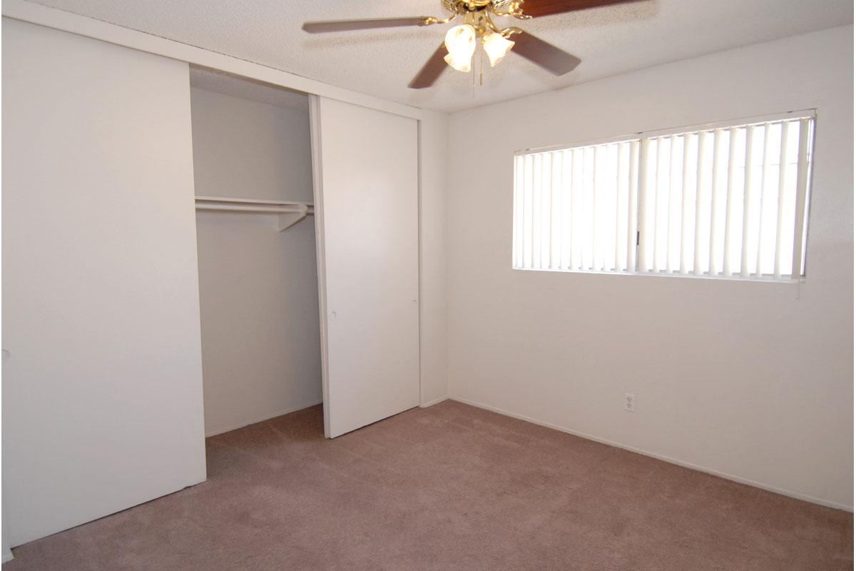 a white refrigerator freezer sitting inside of a building