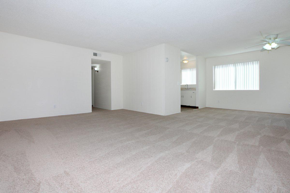 a bedroom with a bed in a room