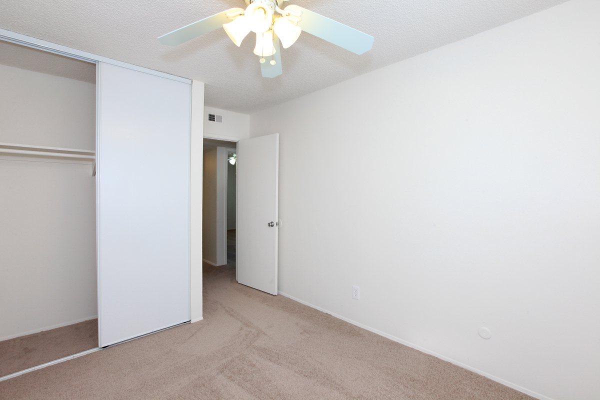 a large white refrigerator in a kitchen
