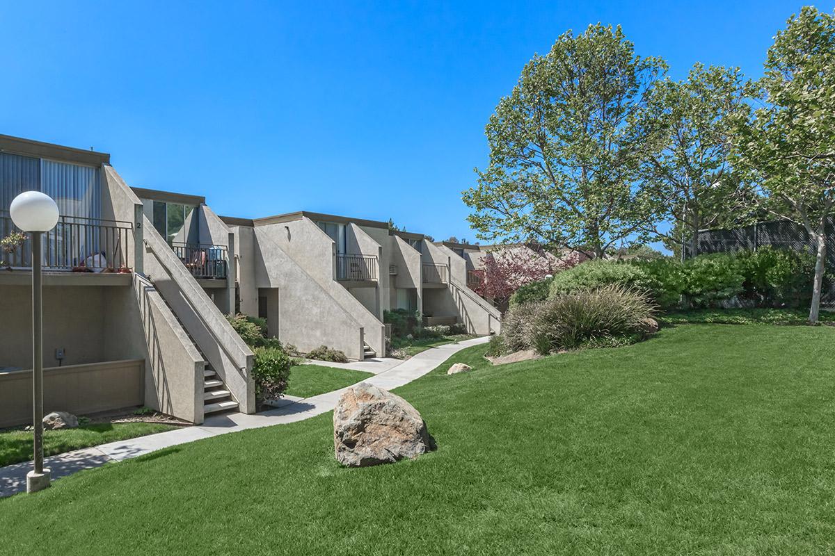 a large lawn in front of a house