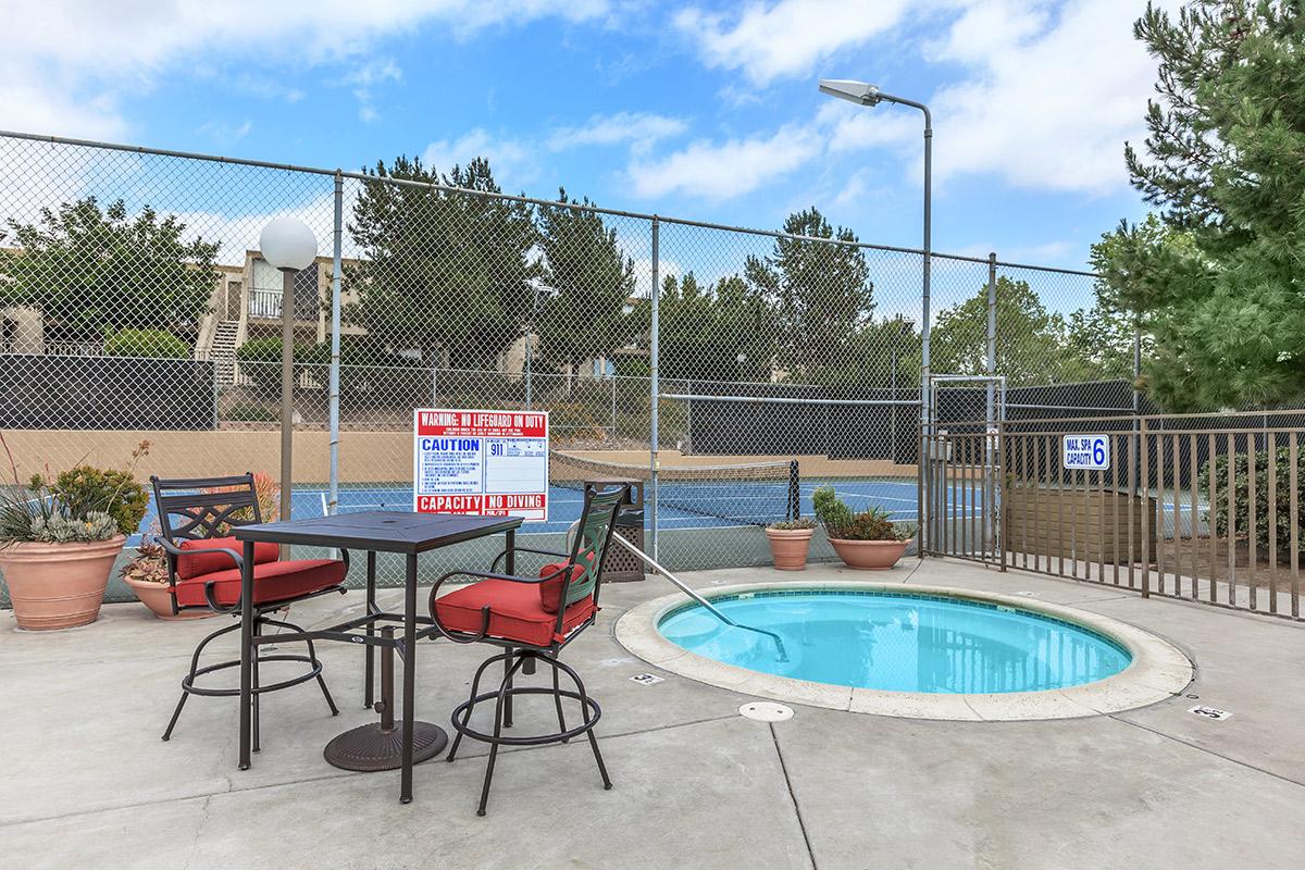 a chair sitting in front of a pool