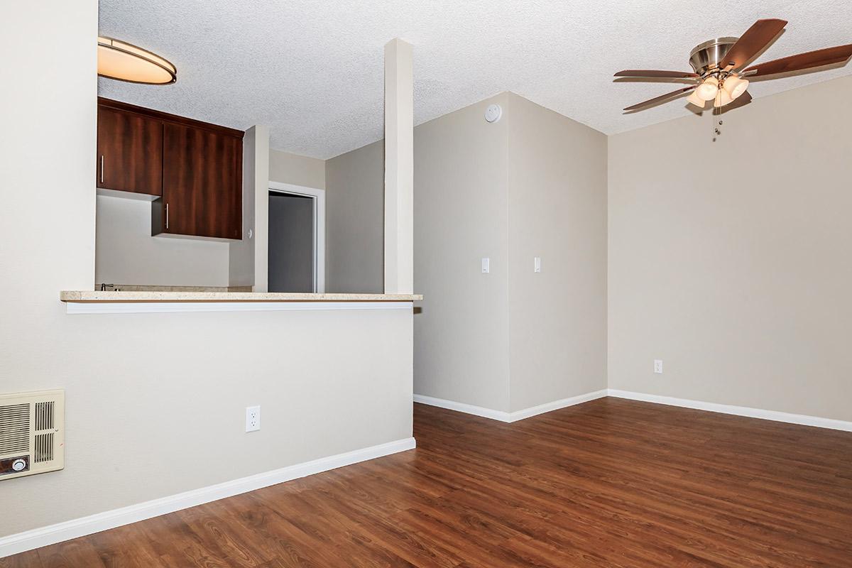 a kitchen with a wood floor