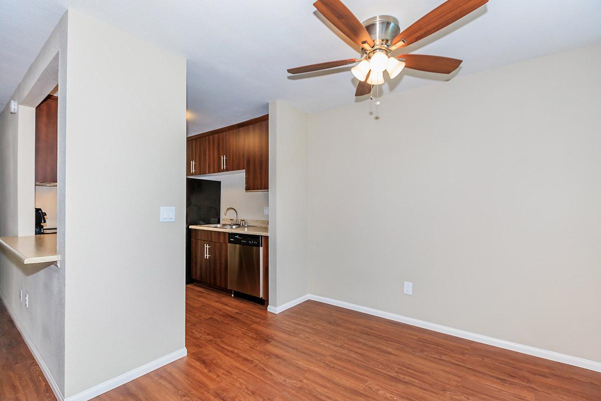 a large empty room with a wood floor