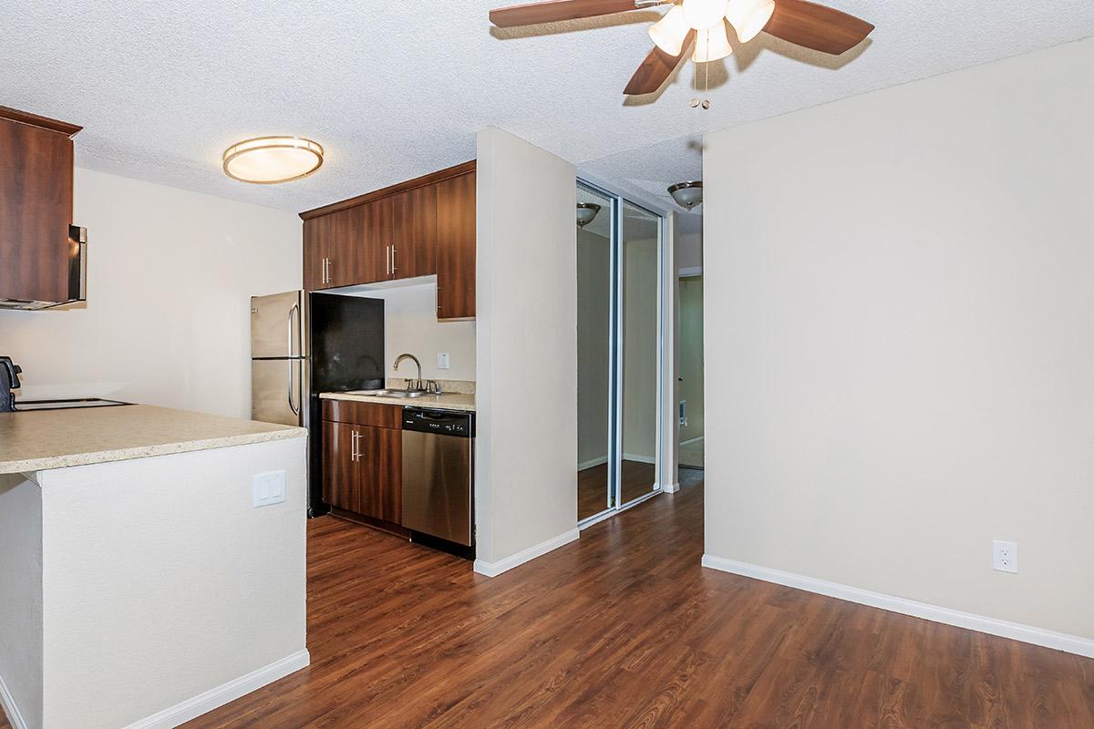 a kitchen with a wood floor