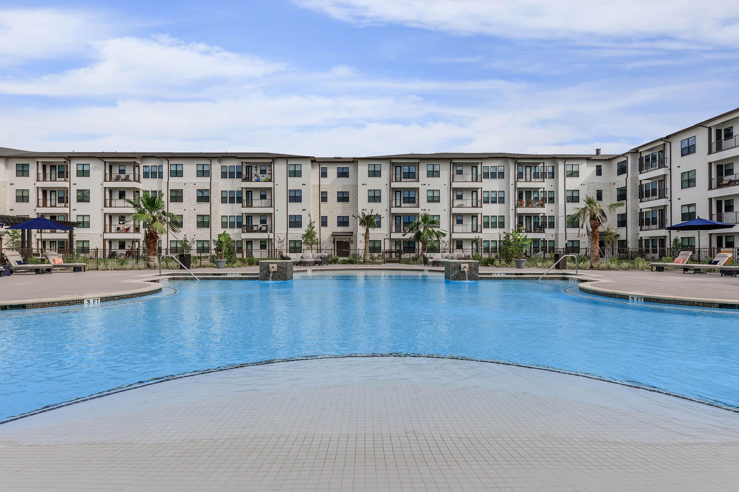 a pool next to a body of water