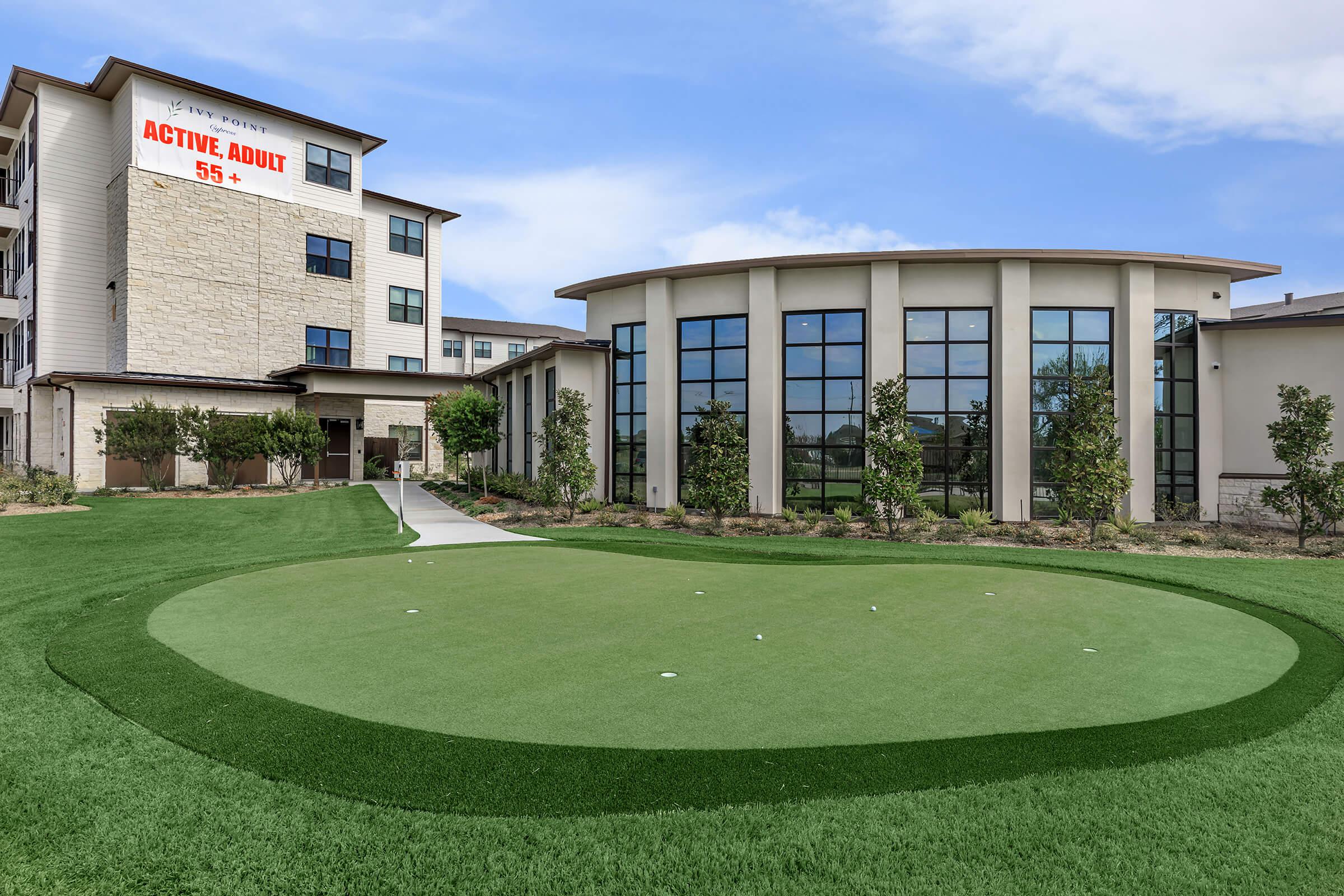 a large lawn in front of a building