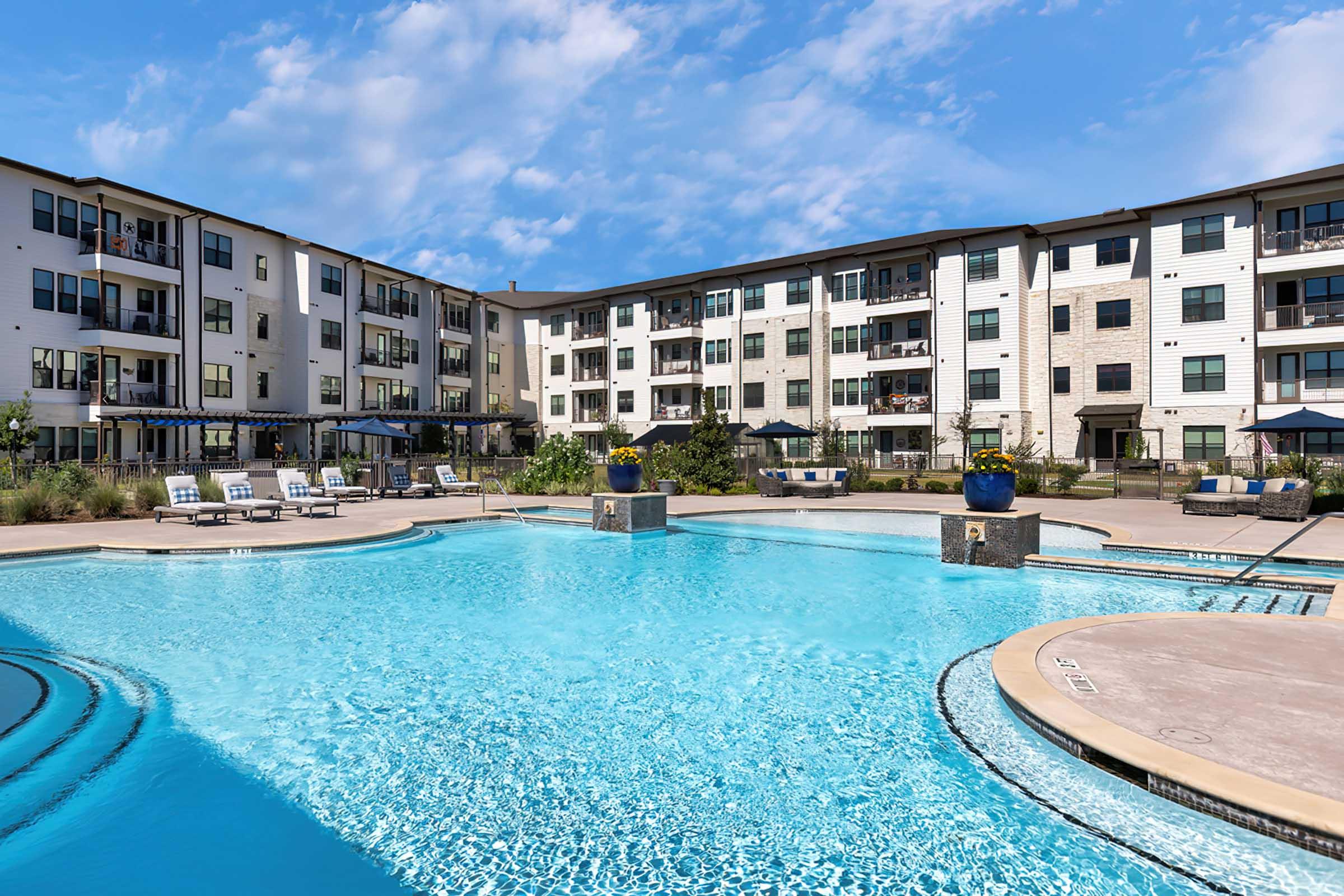 a pool next to a body of water