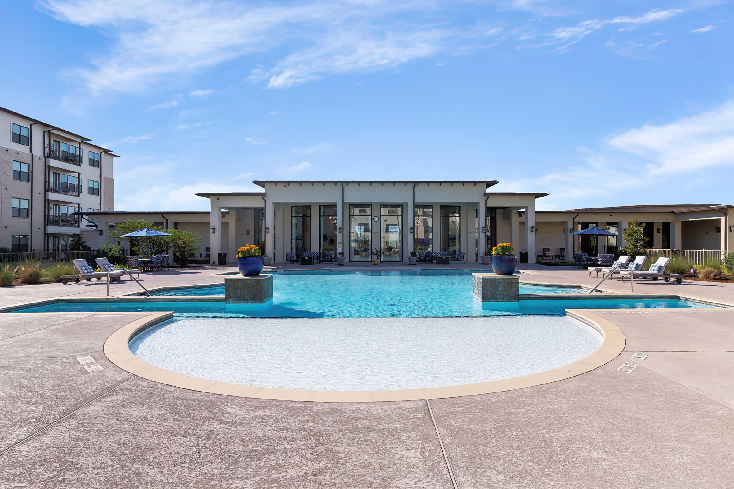 a pool next to a body of water