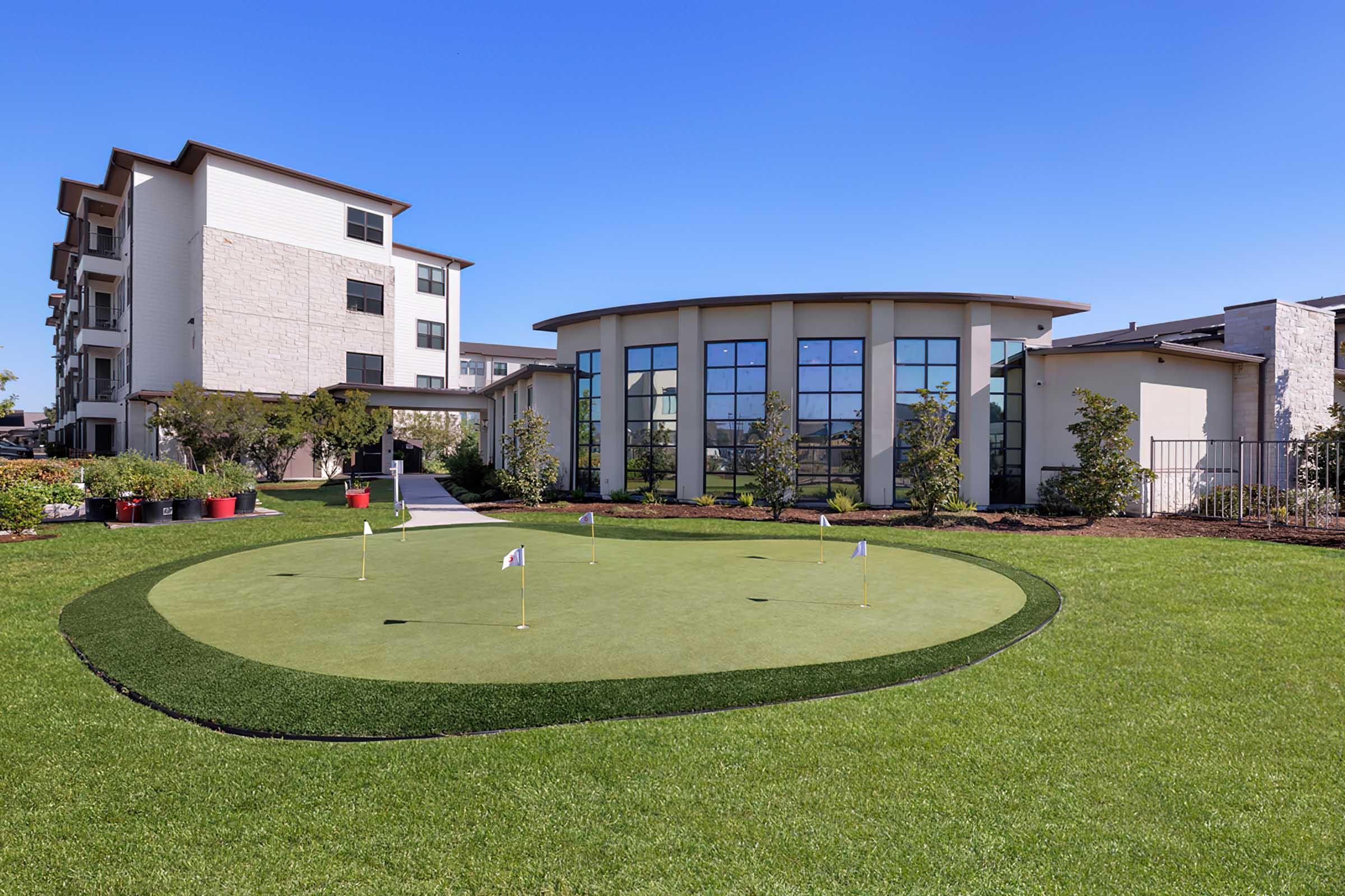 a large lawn in front of a building