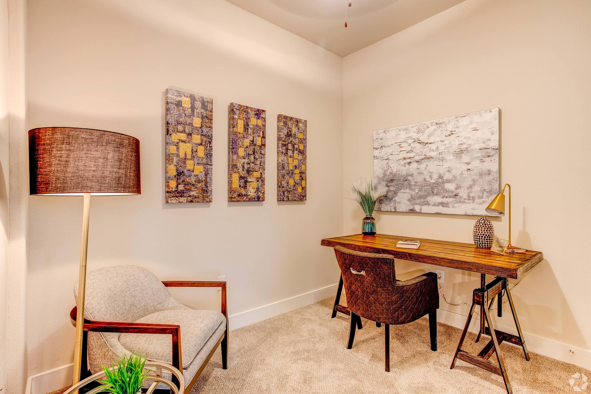 a room filled with furniture on top of a wooden chair