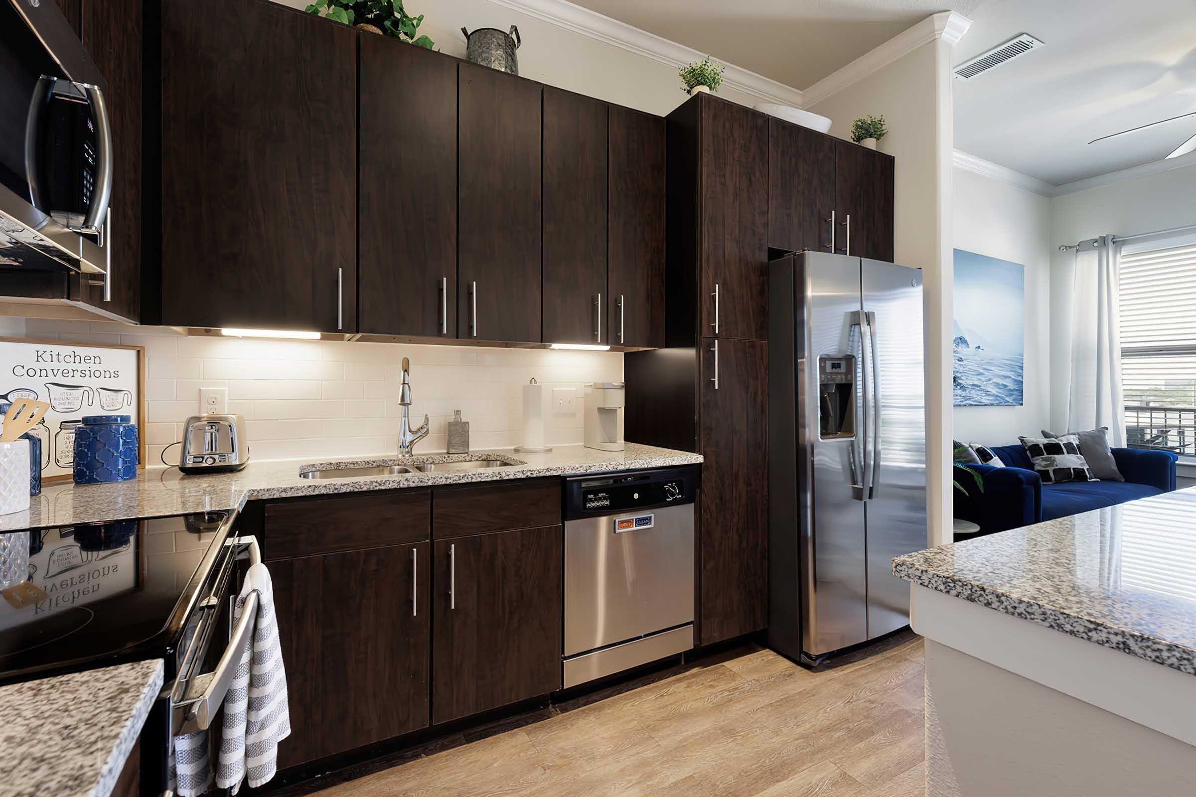 a kitchen with a sink and a window