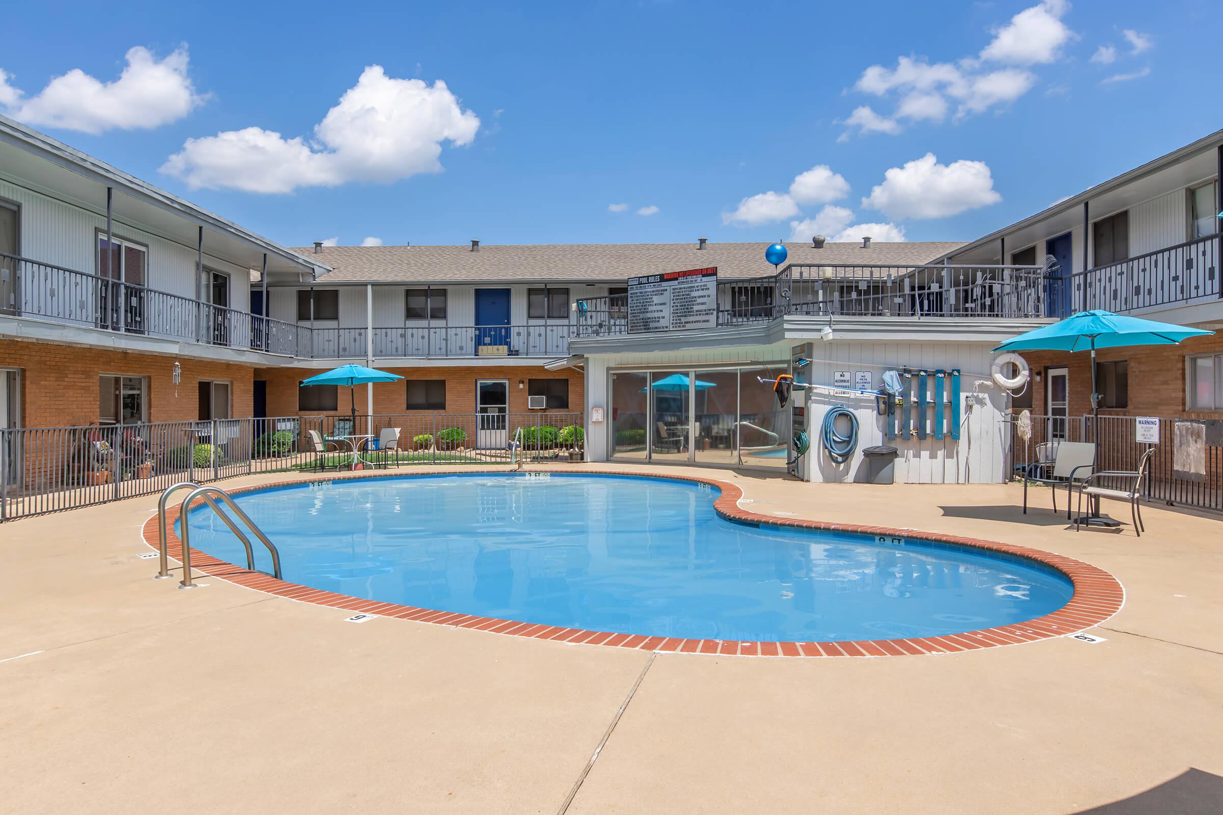 a pool next to a building