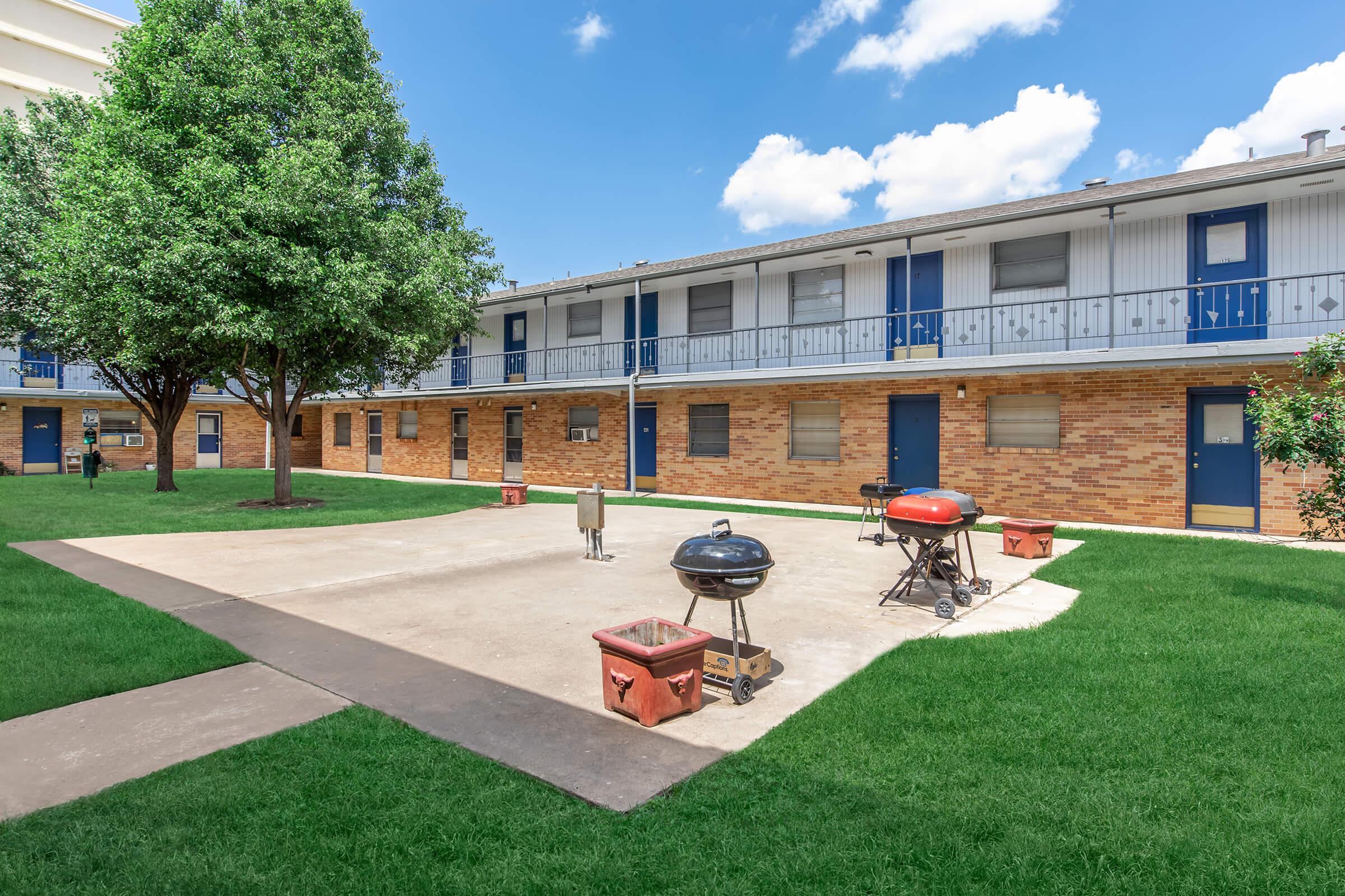 a large lawn in front of a building