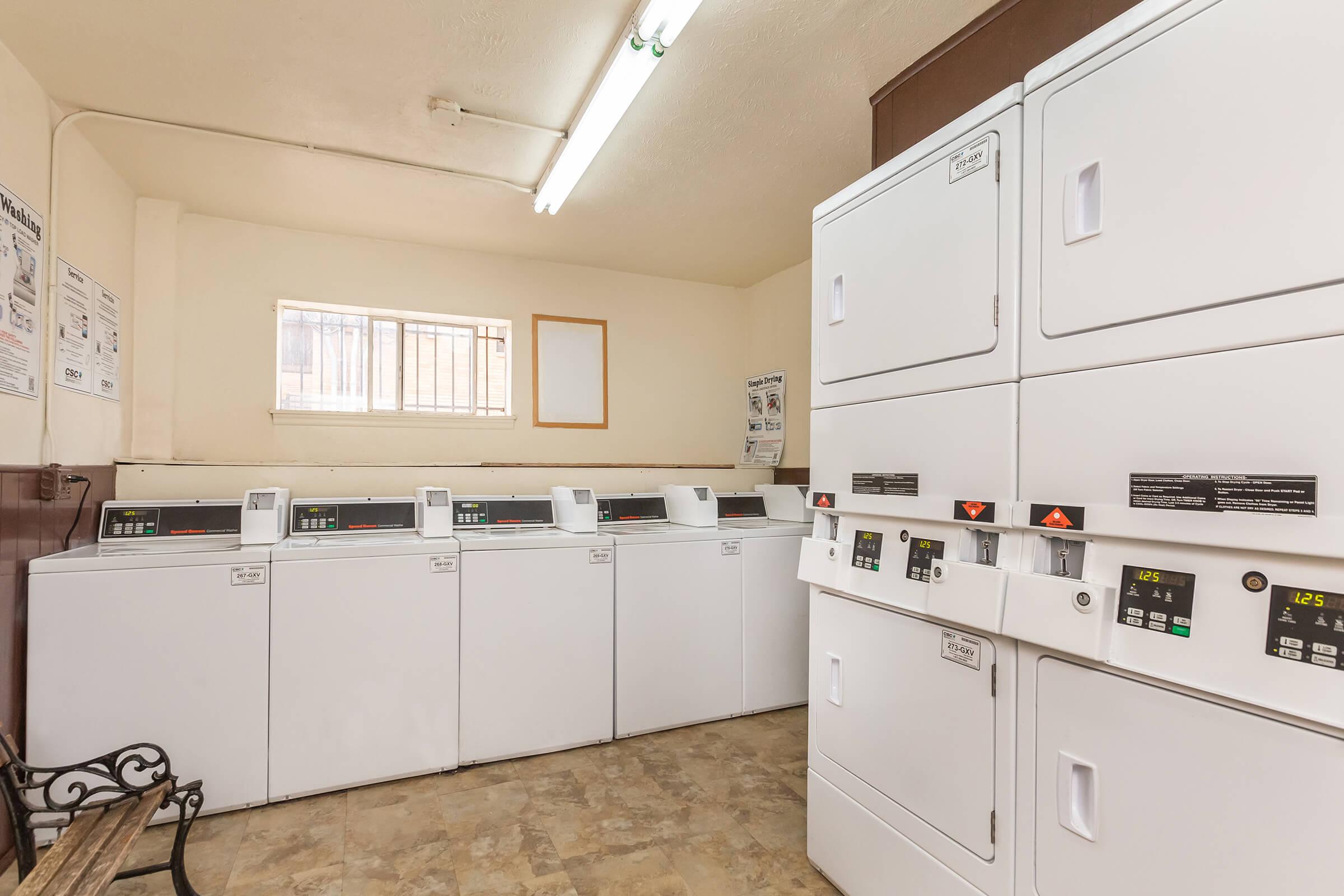 a kitchen with a stove and a refrigerator