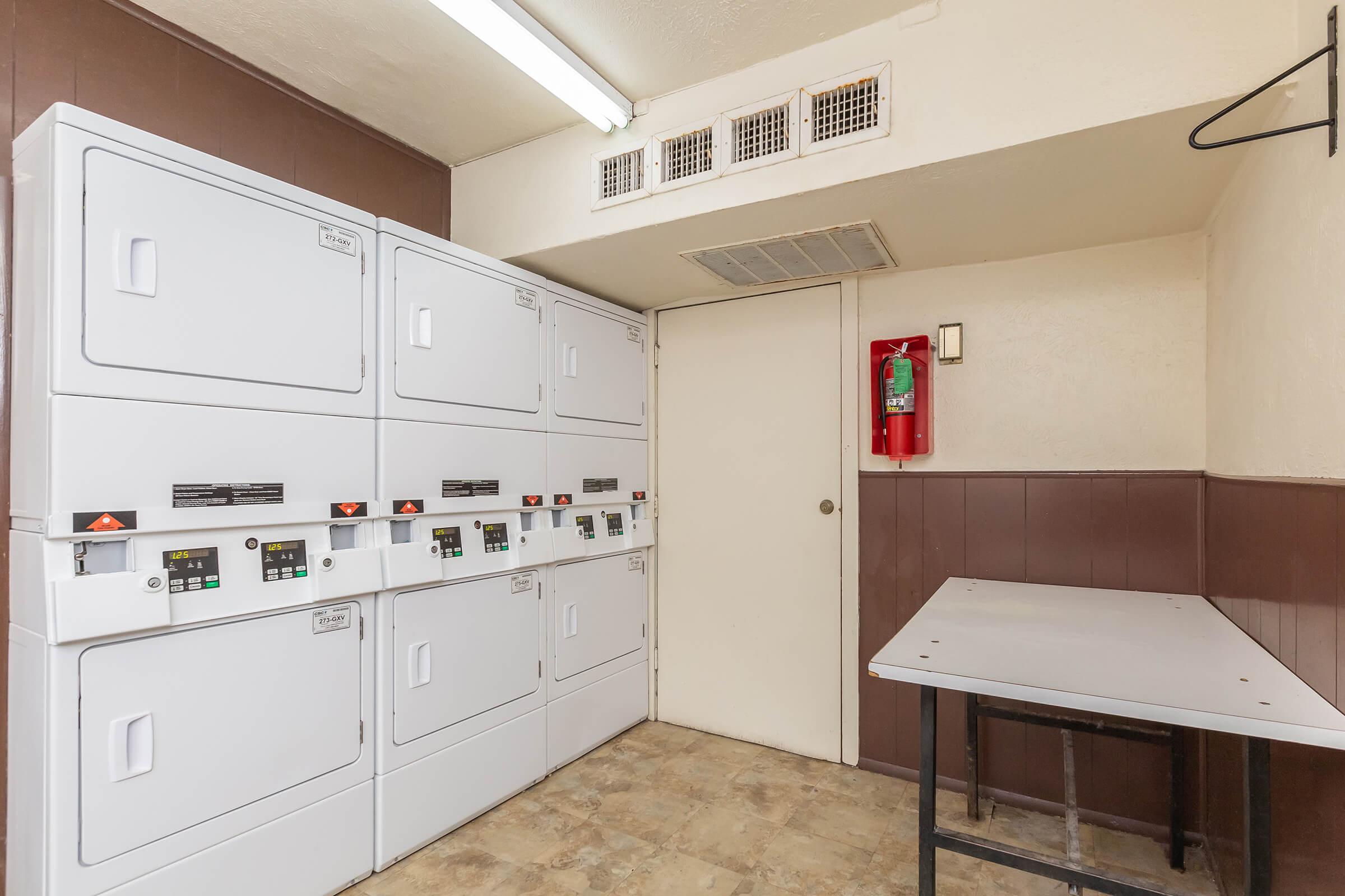 a kitchen with a stove and a refrigerator