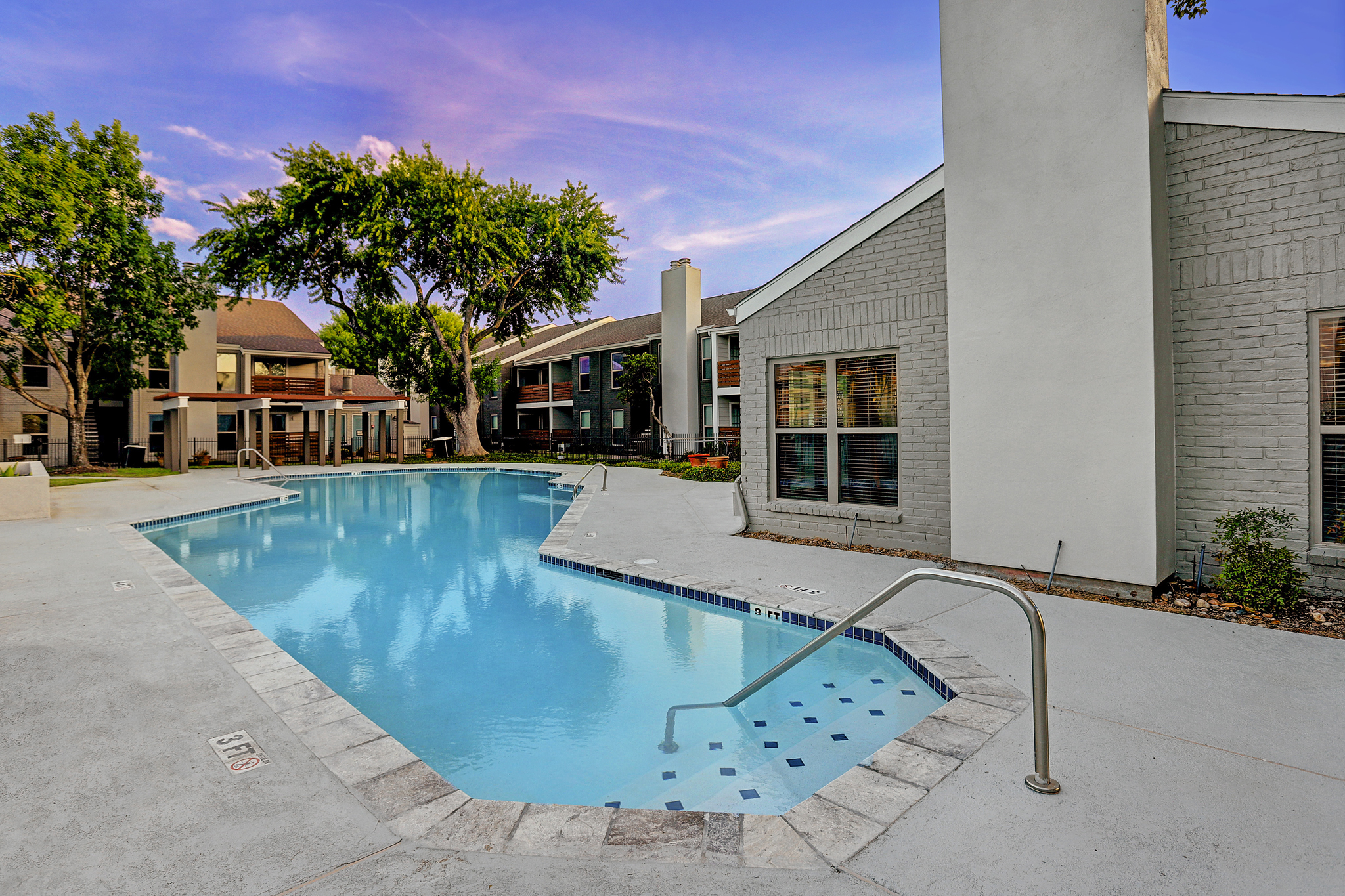a pool next to a building