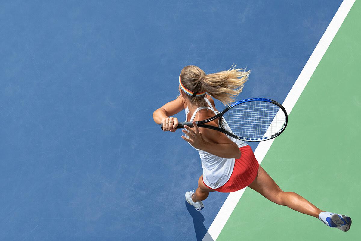 woman playing tennis - GettyImages-1026766054.jpg