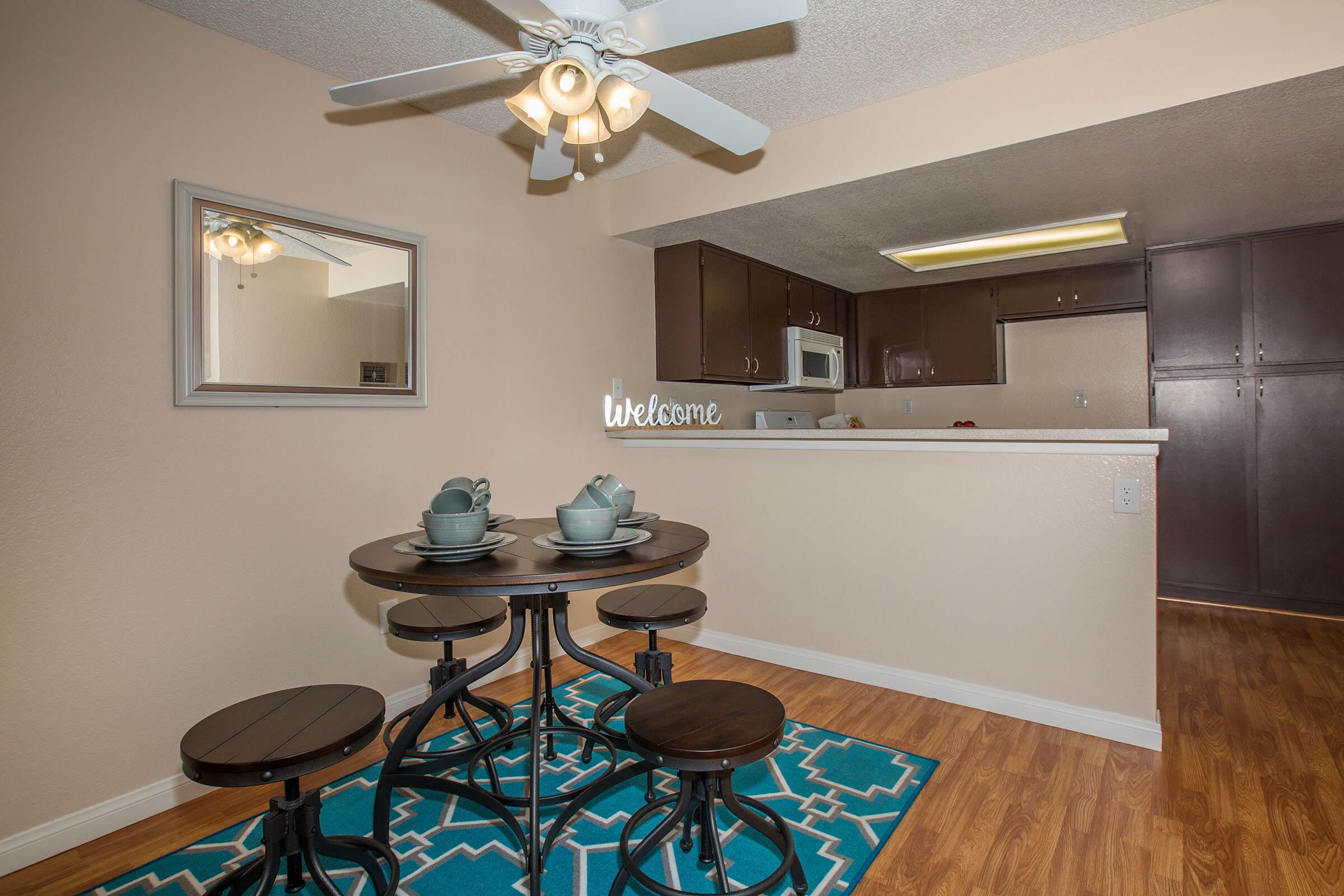 a kitchen with a table in a room
