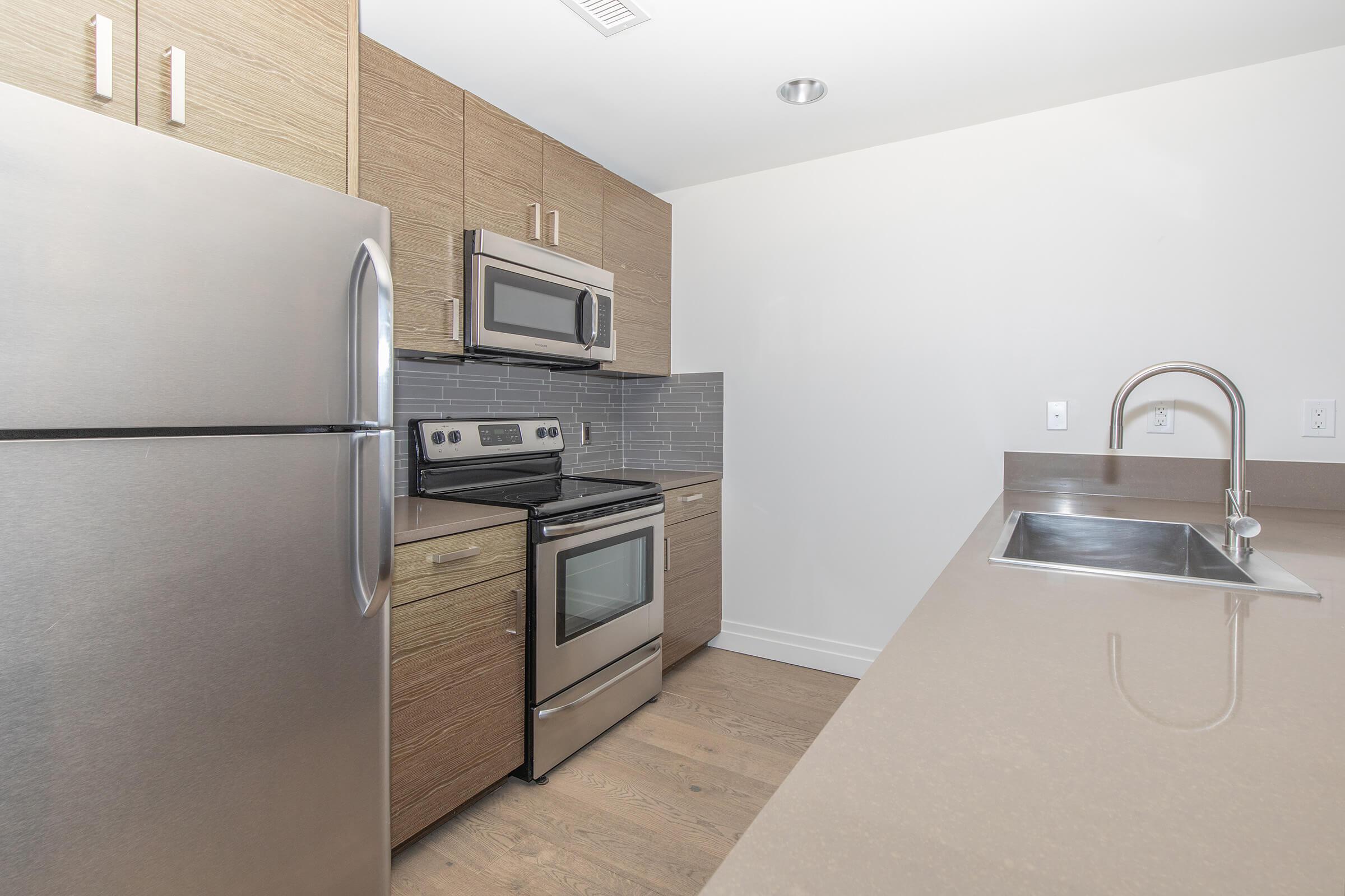 a stainless steel refrigerator in a kitchen