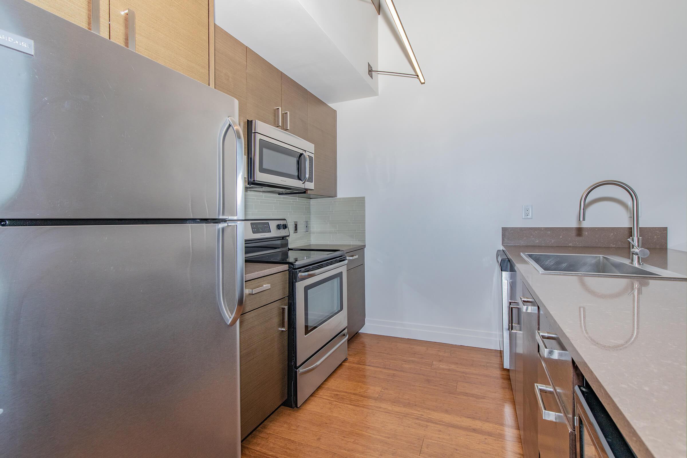 a stainless steel refrigerator in a kitchen