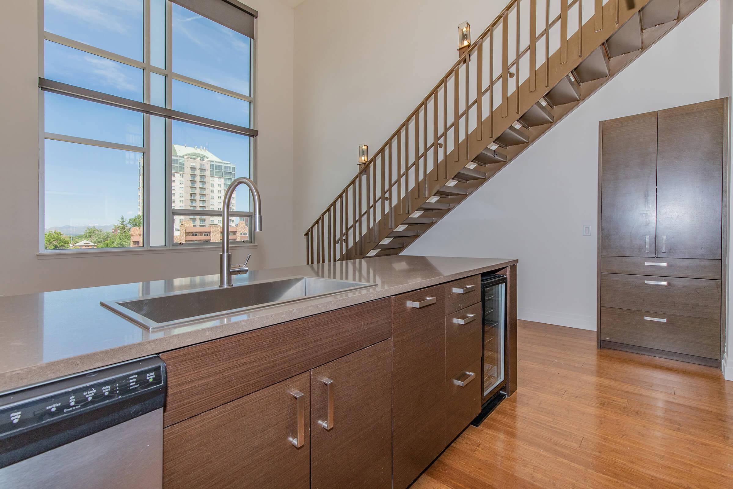 a kitchen with a large window