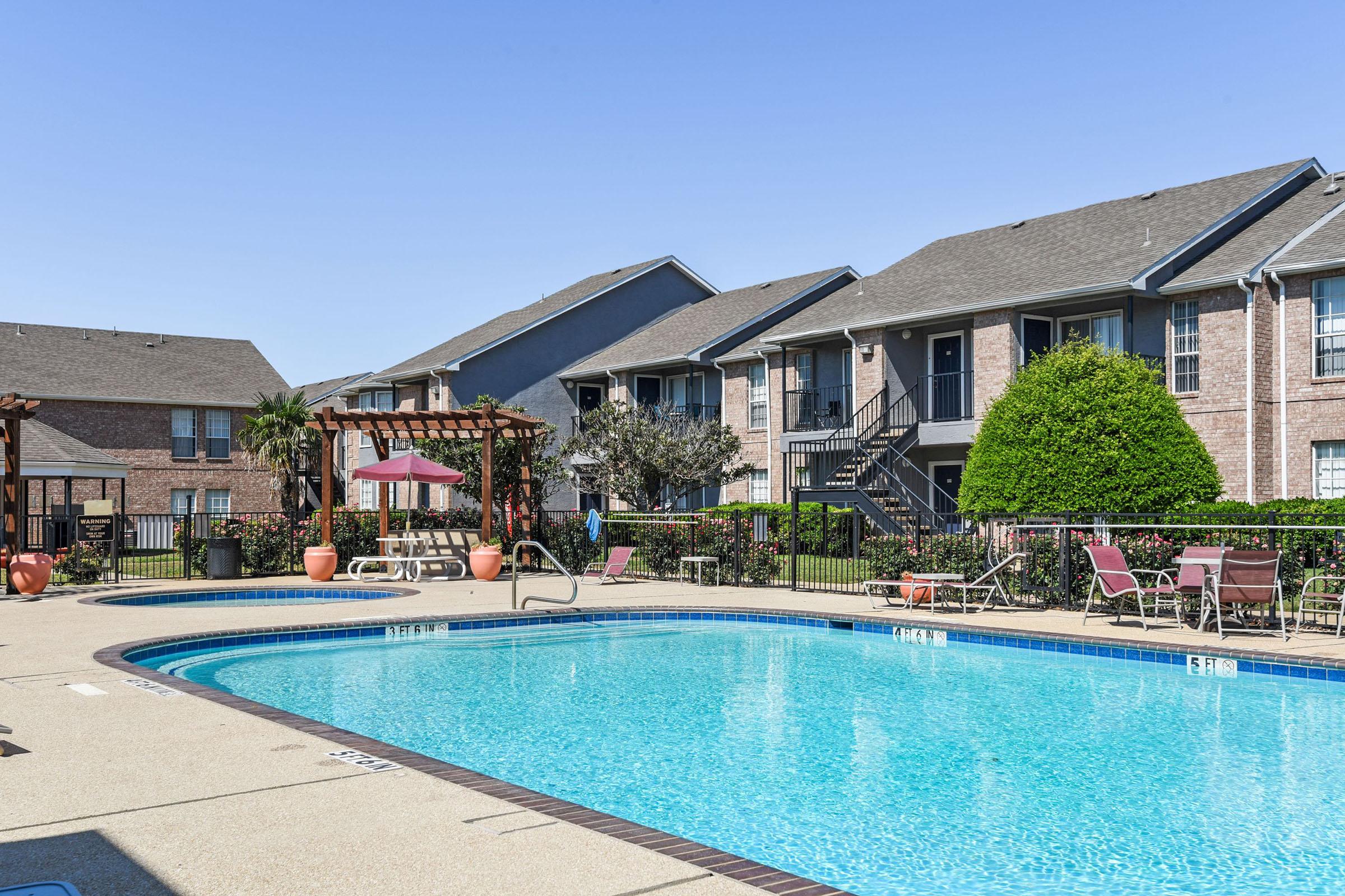 a house with a large pool of water