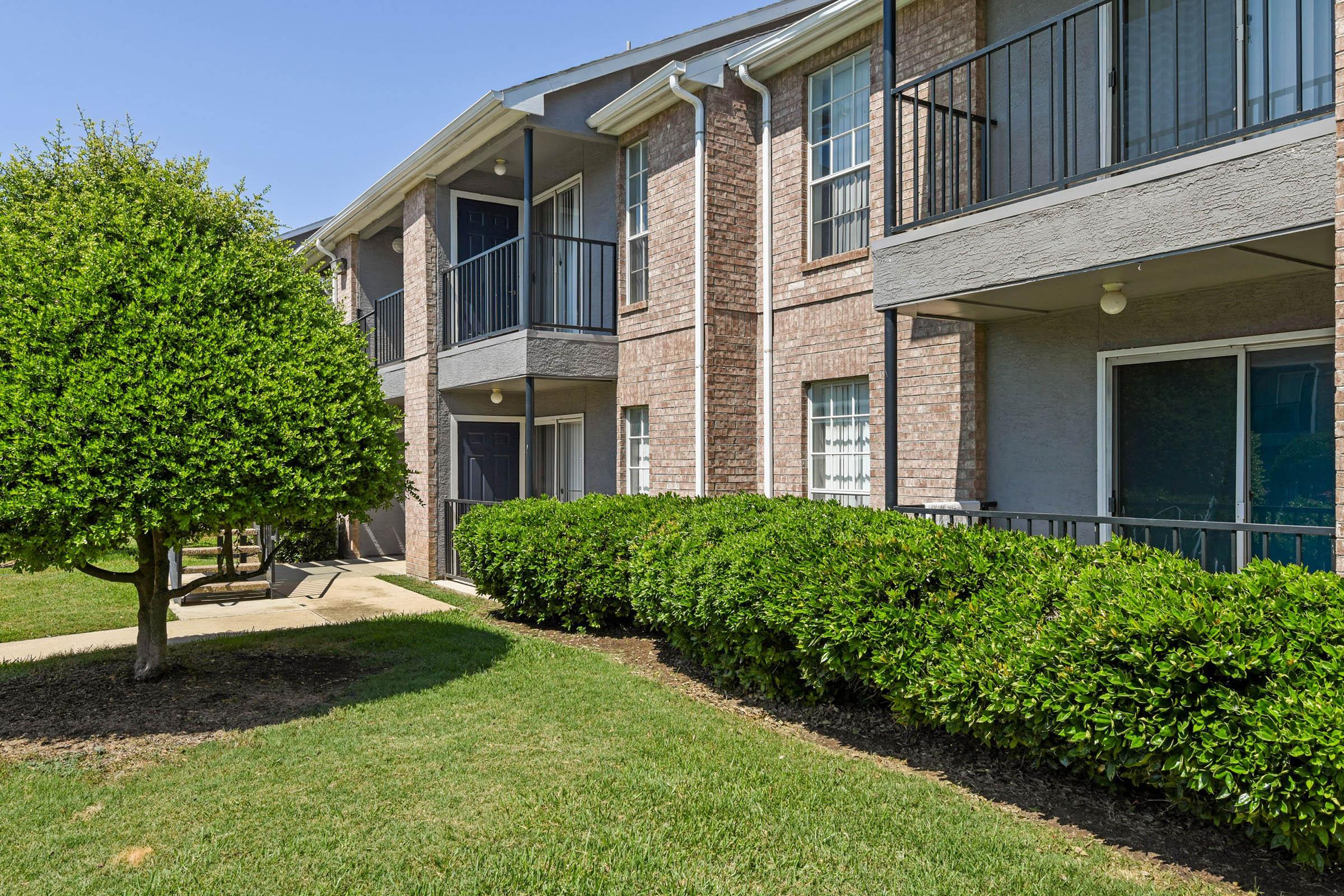 a large lawn in front of a house