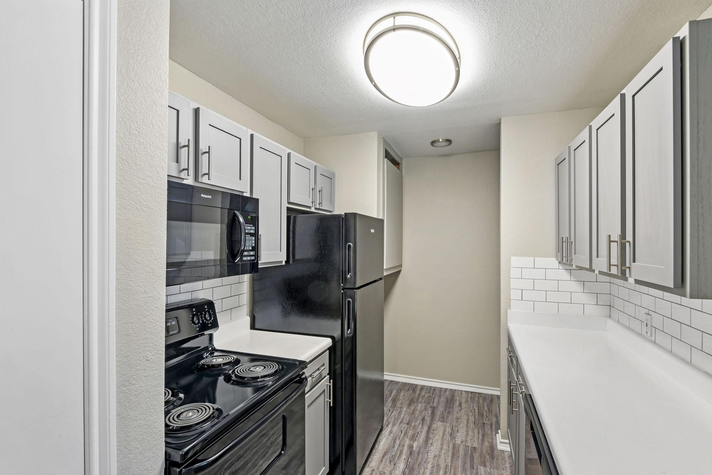 a stainless steel refrigerator in a kitchen