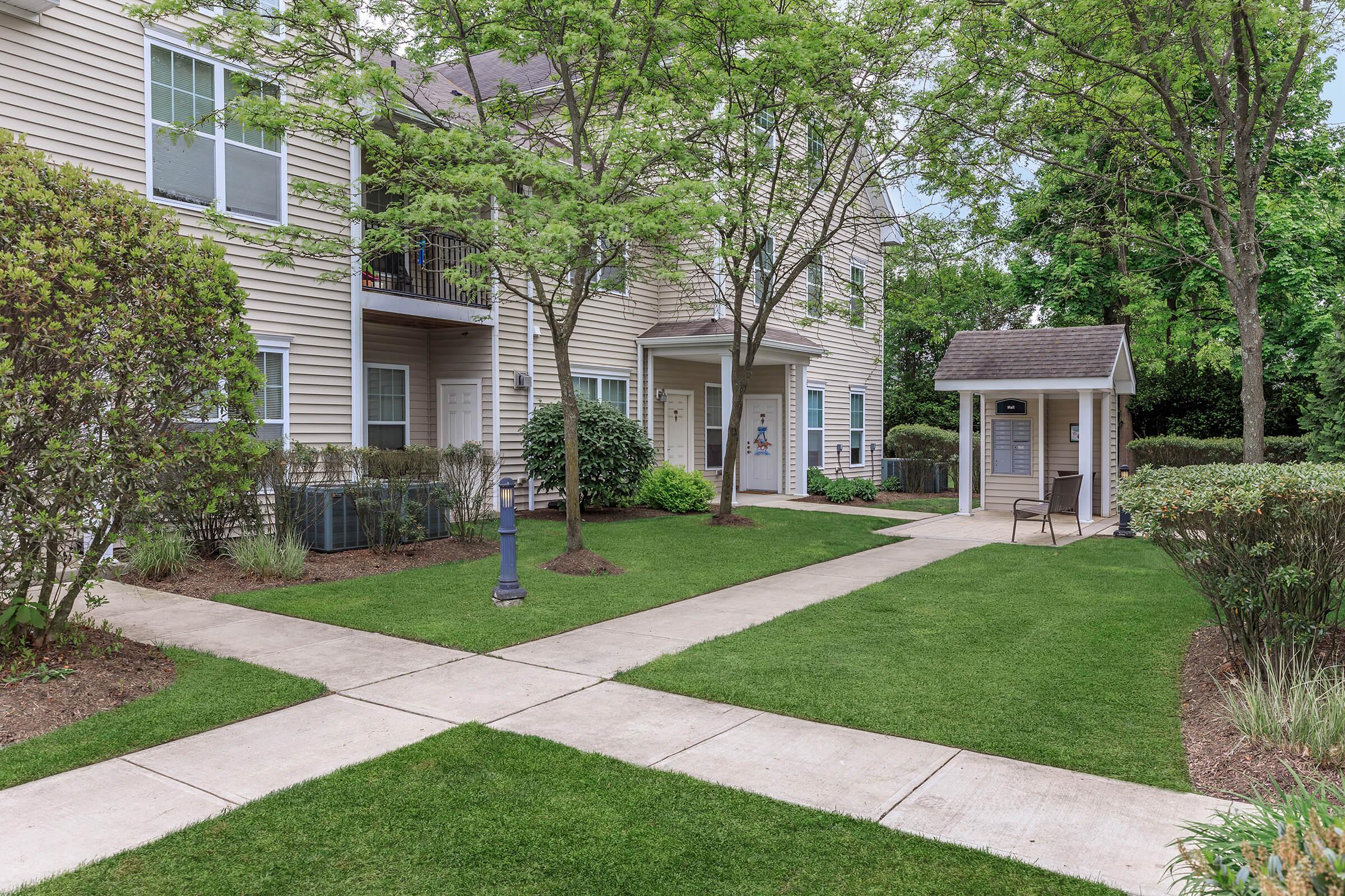 a large lawn in front of a house