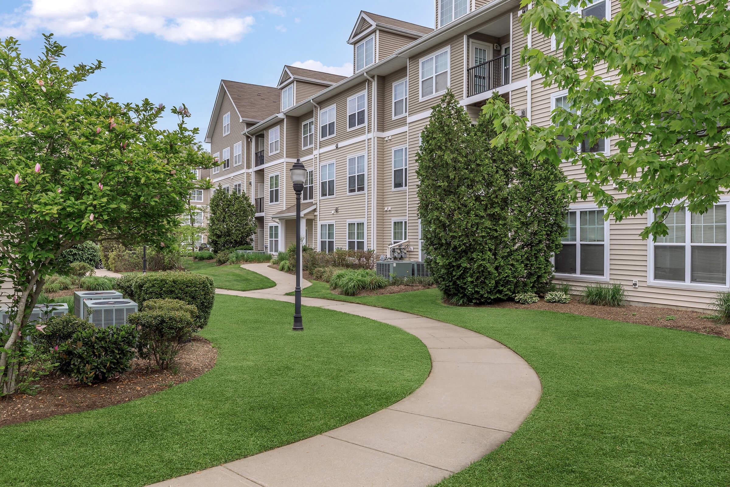 a large lawn in front of a building