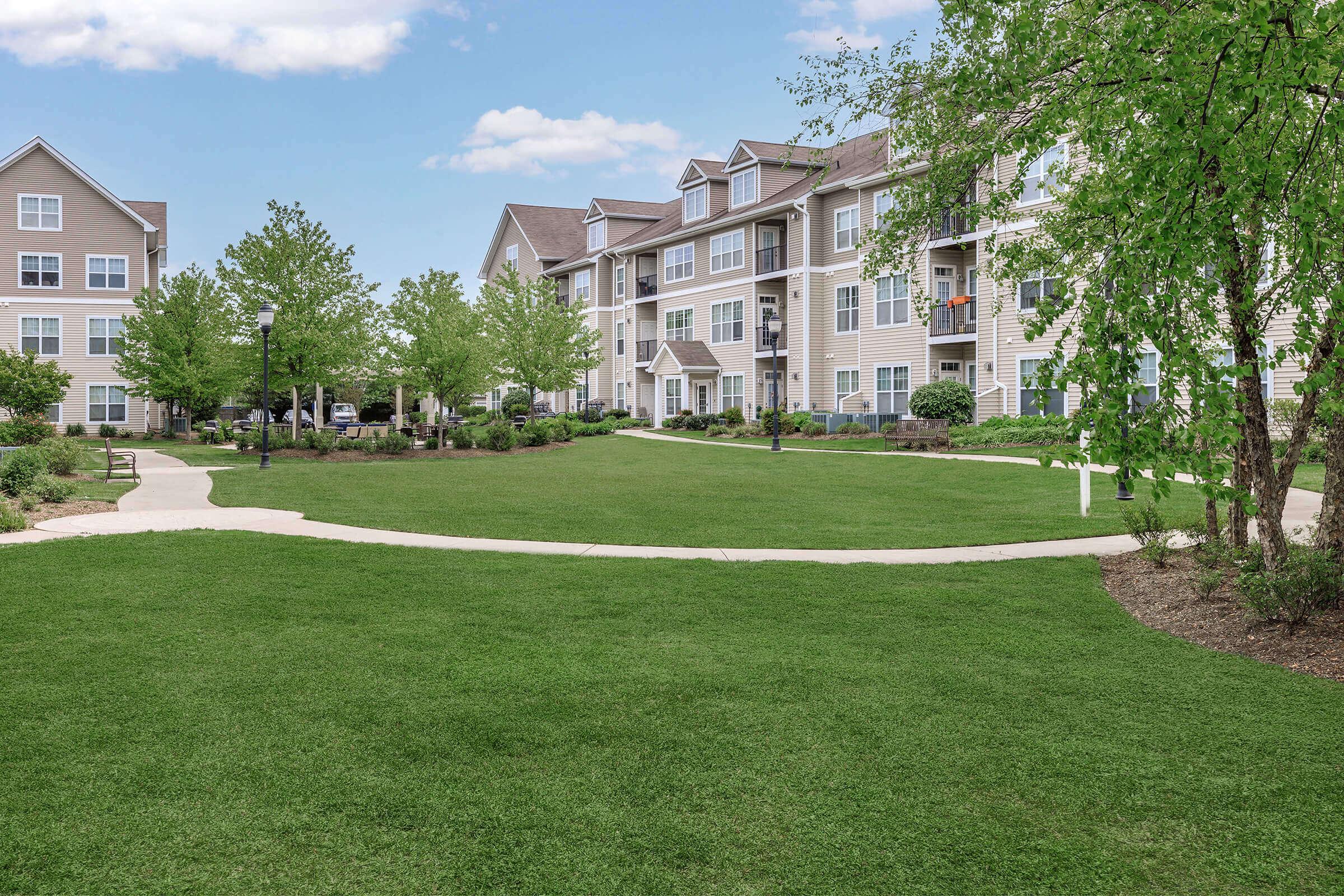 a large lawn in front of a building