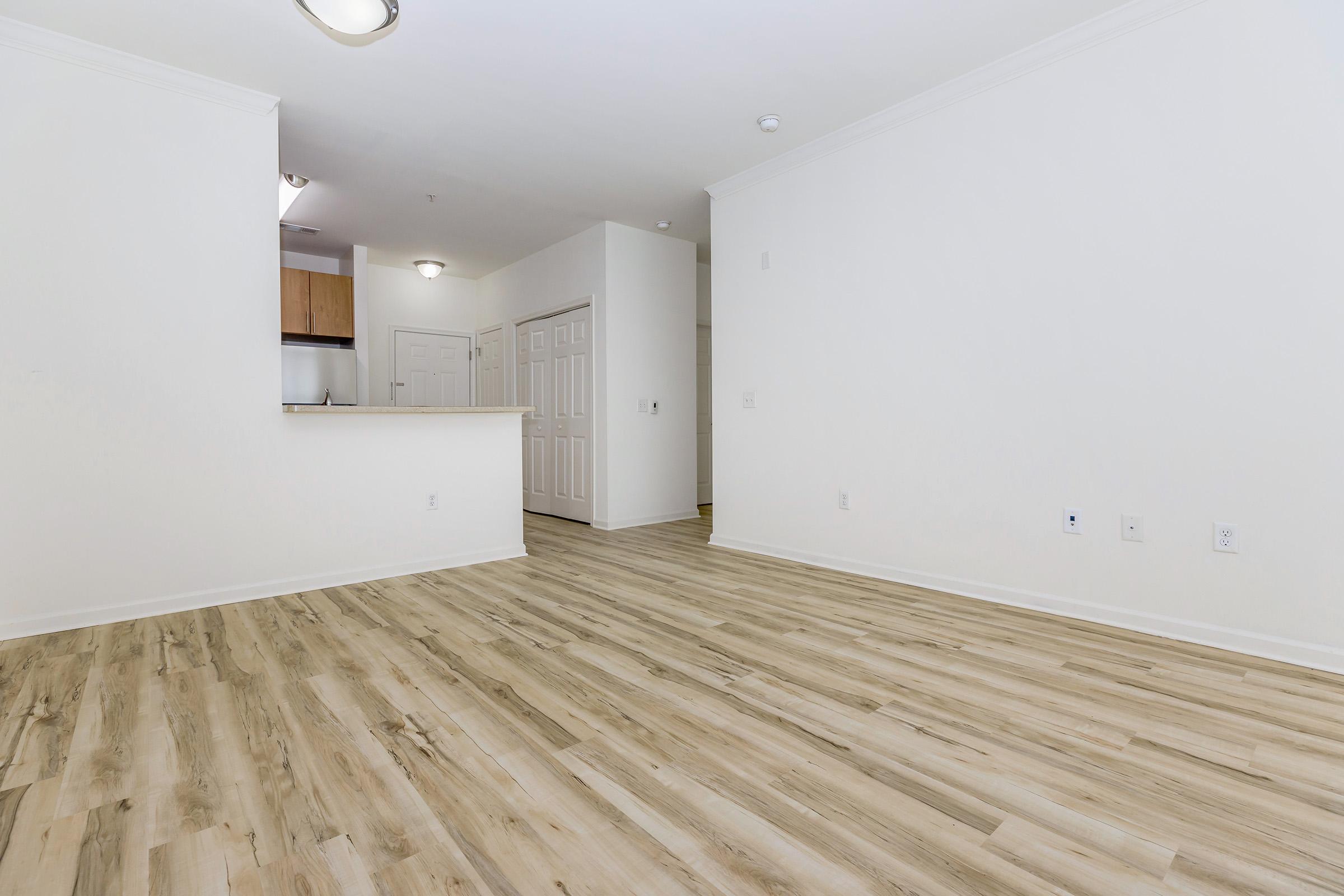 a bedroom with a building in the background