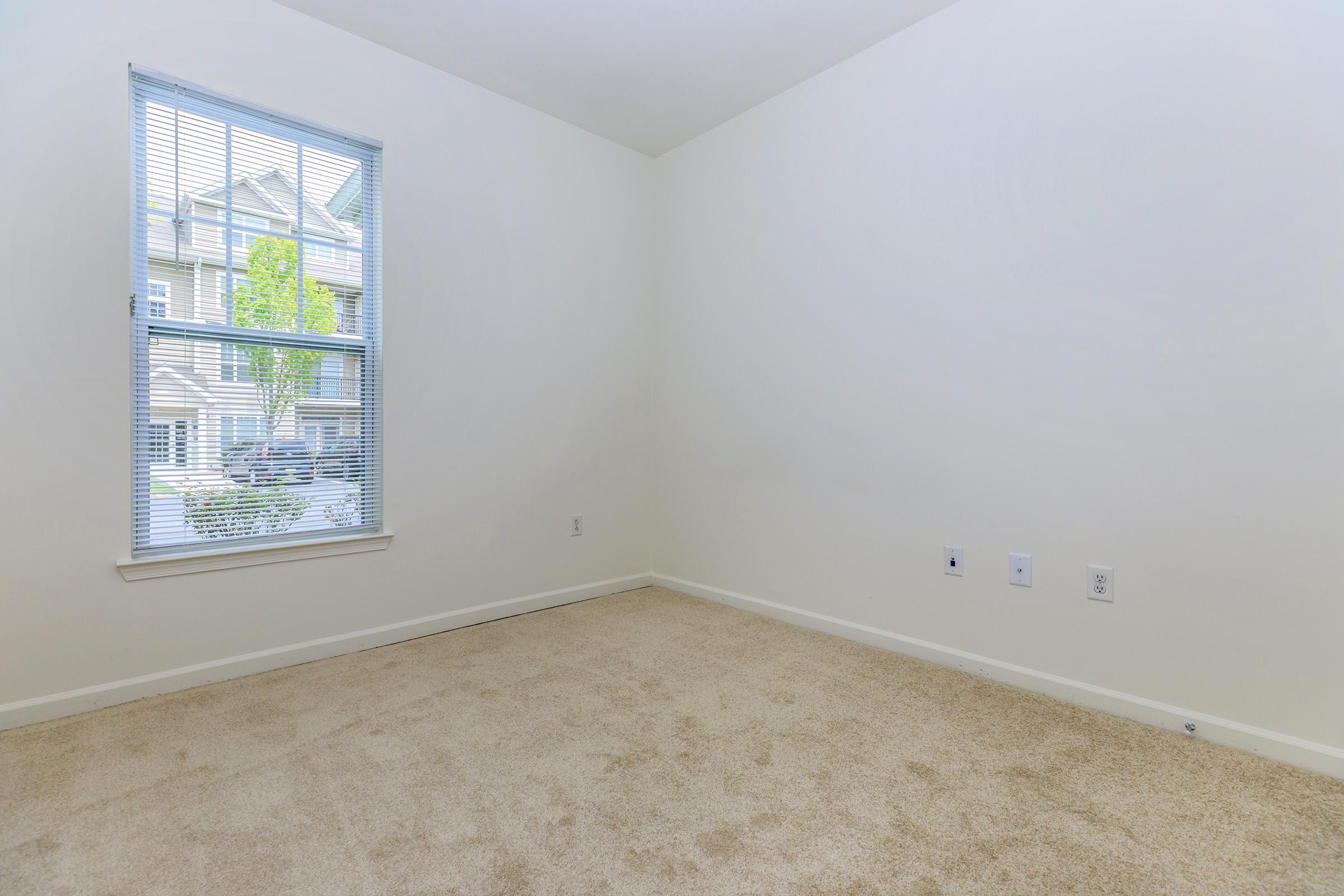 a room with a sink and a window