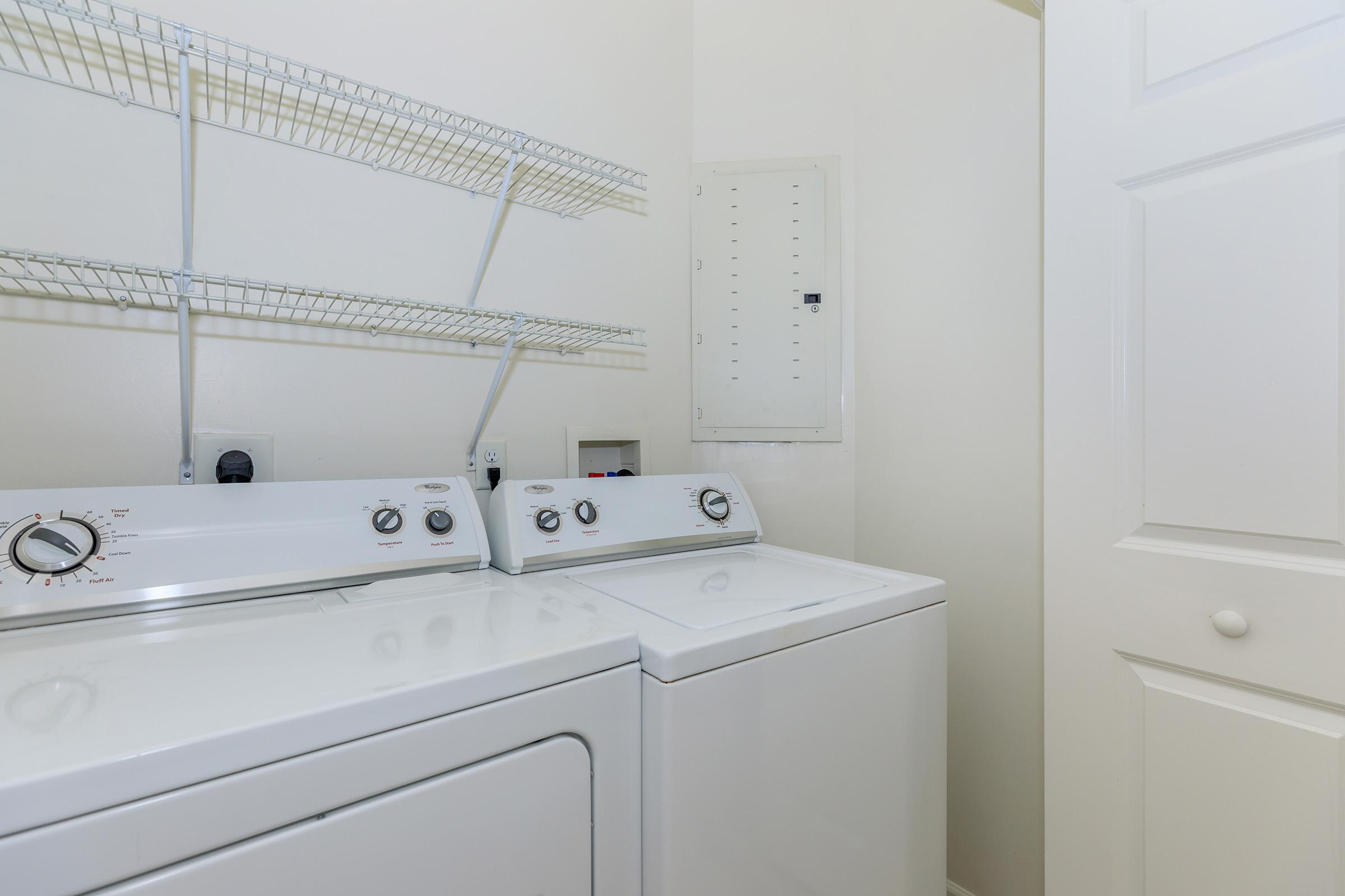 a kitchen with a sink and a mirror