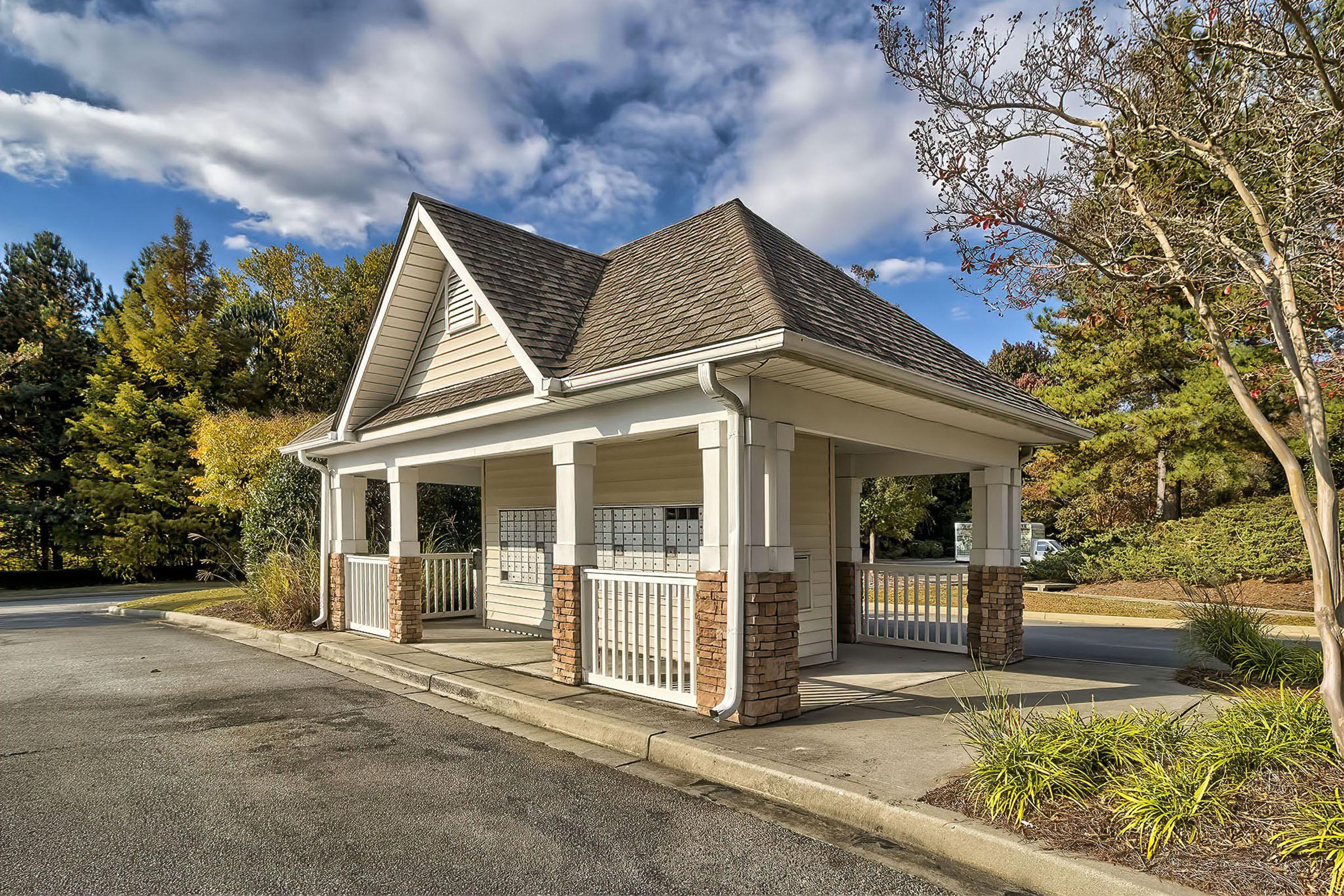 a house with trees in the background