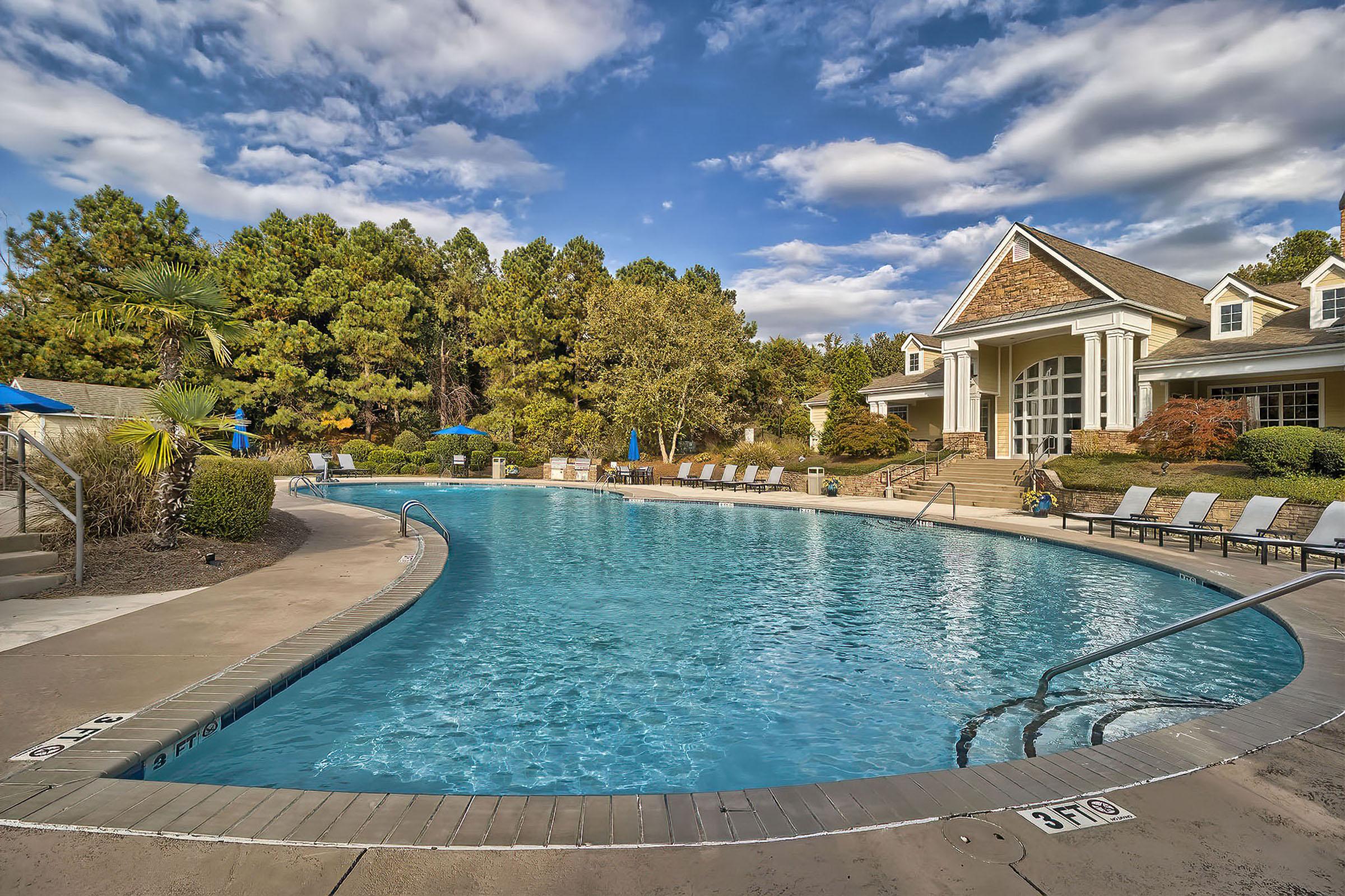 a pool next to a body of water