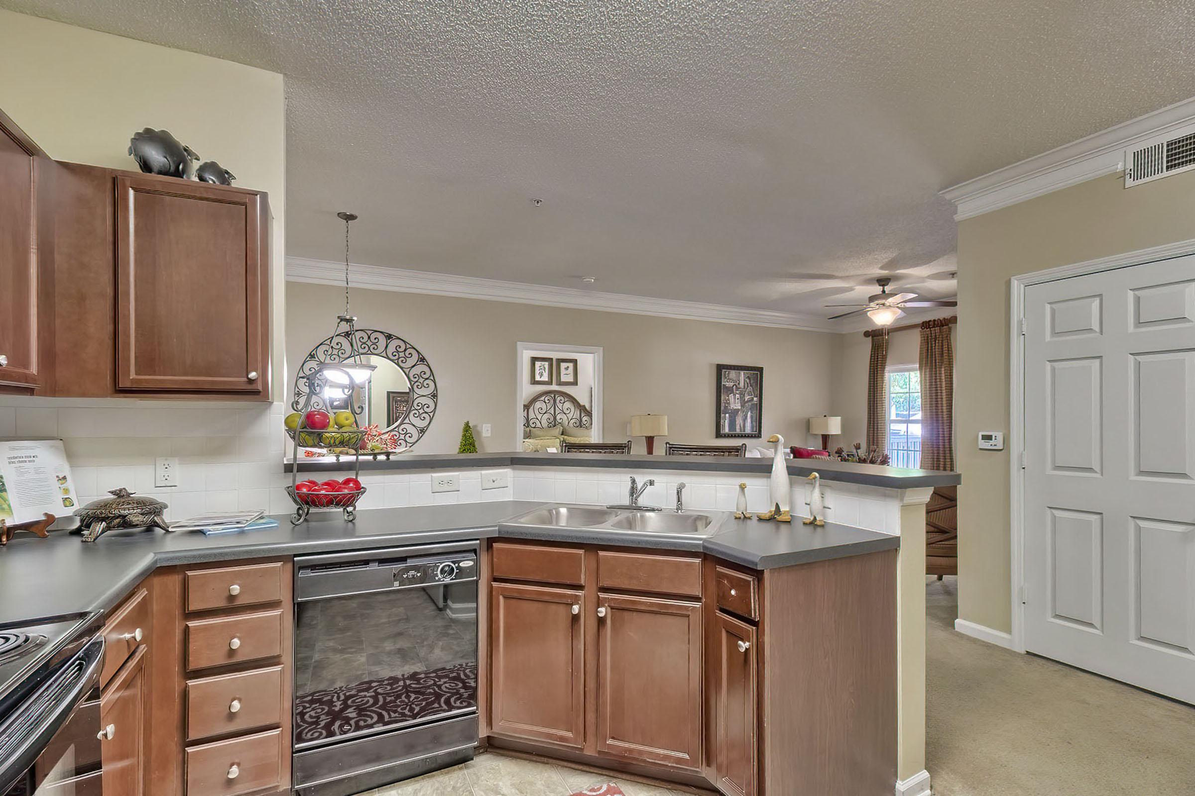 a kitchen filled with lots of furniture