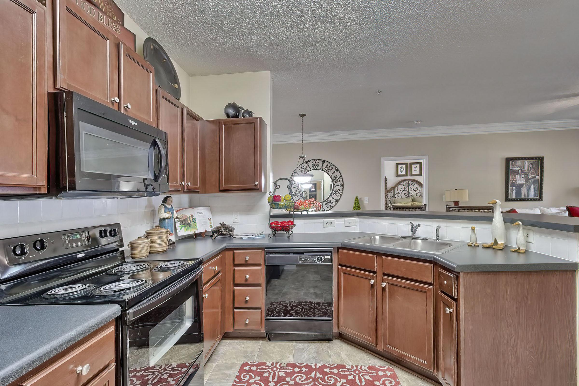 a kitchen with a stove top oven