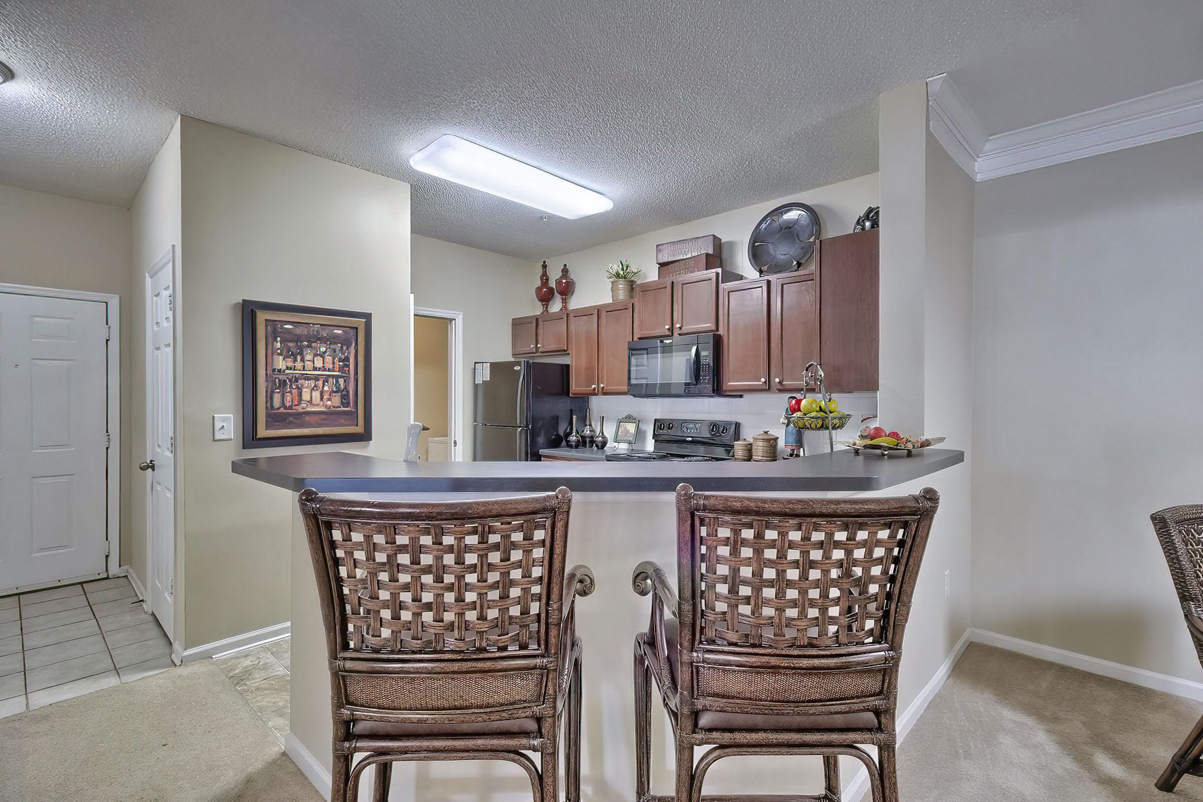 a room filled with furniture and a stove