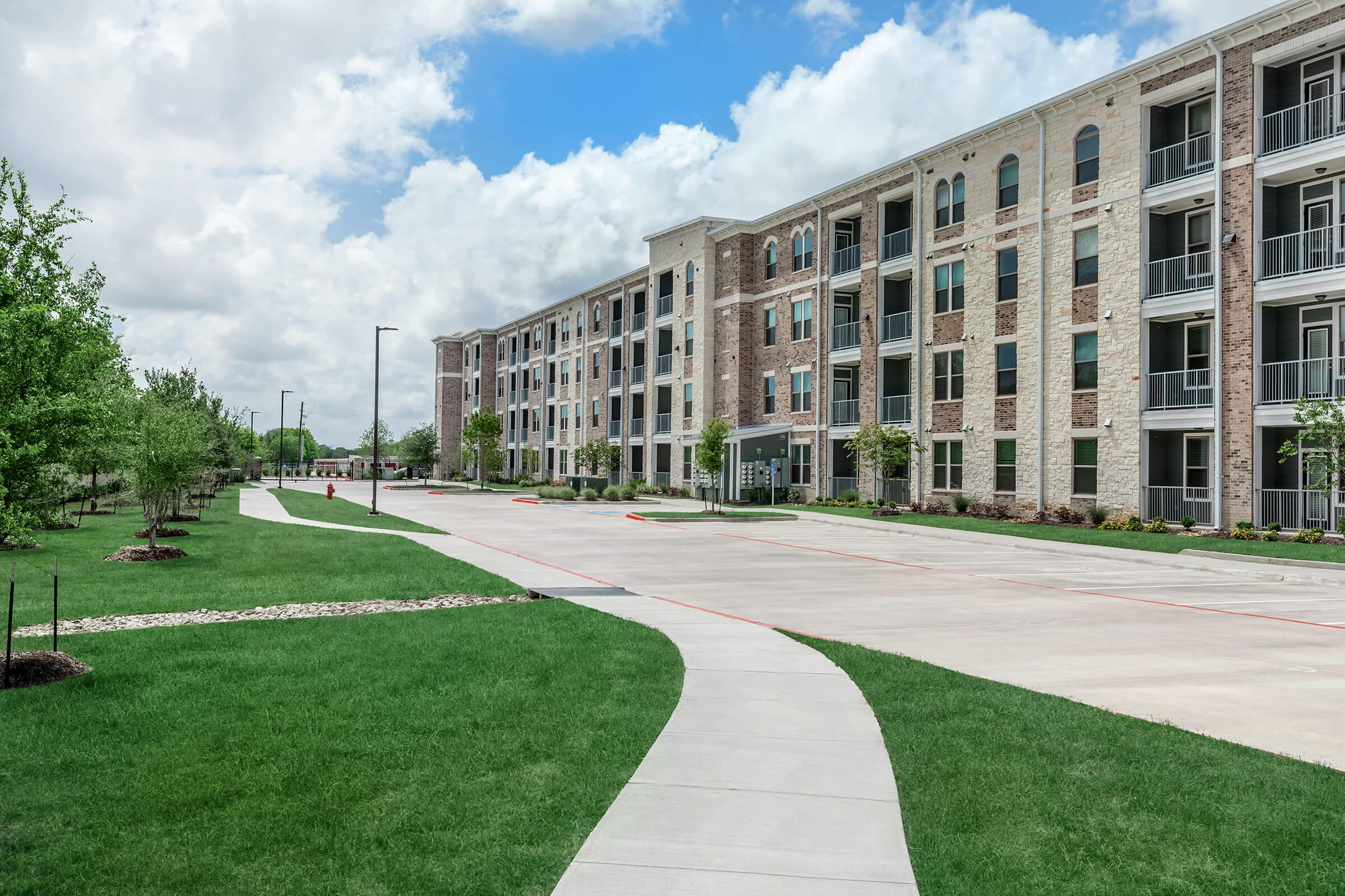 a large lawn in front of a building