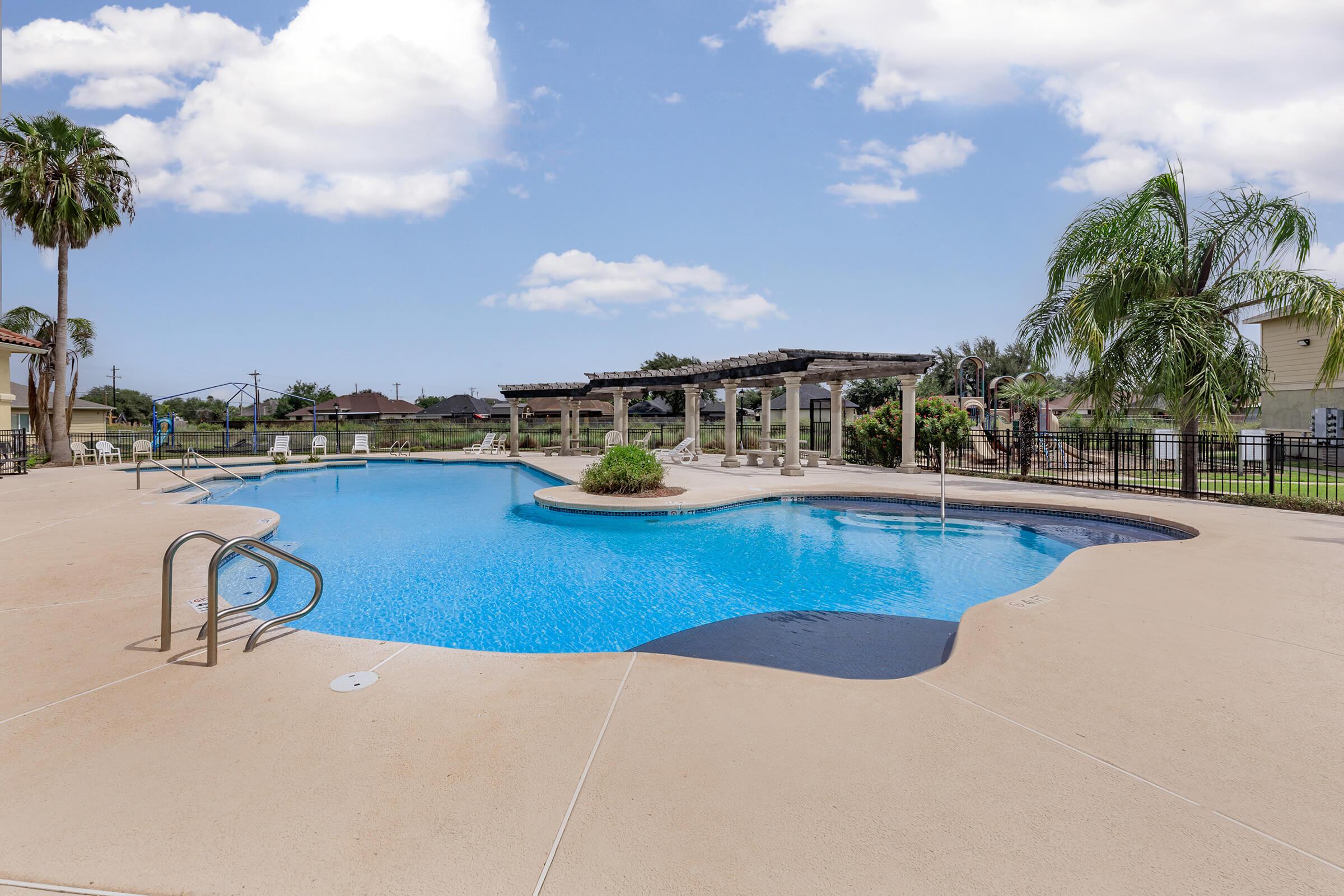 a pool next to a body of water