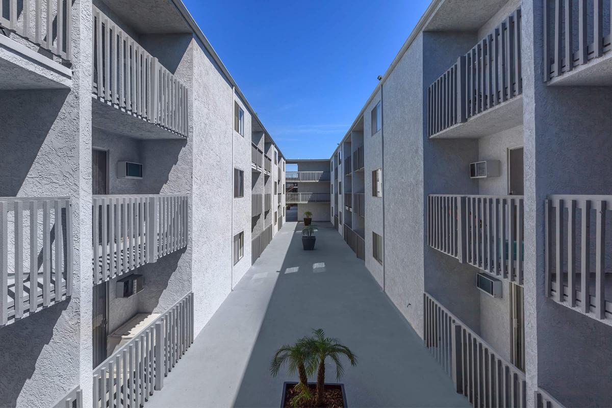 Pacific View Apartment Homes courtyard with green plants