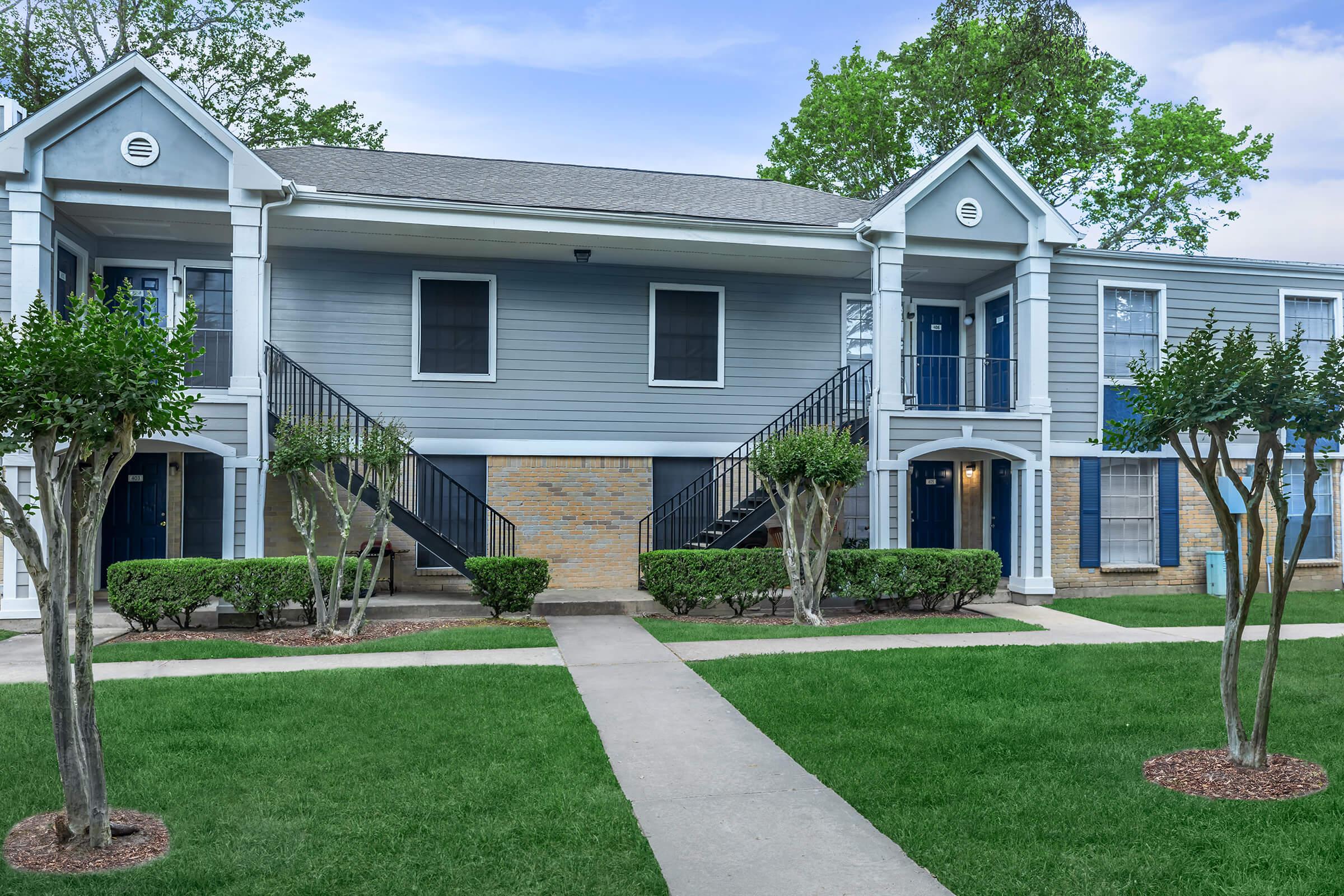 a large lawn in front of a house